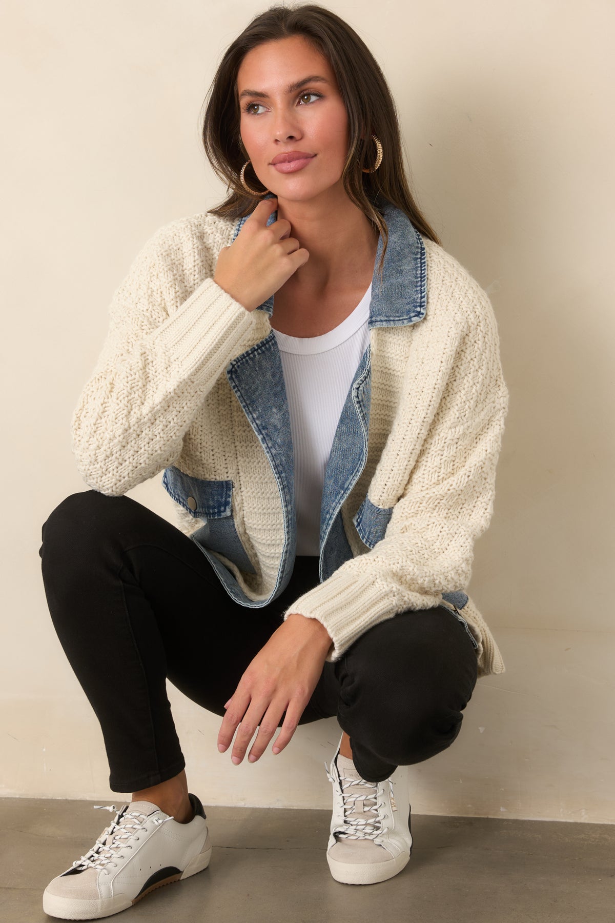 Ivory mixed-media jacket featuring denim accents at the collar, front placket, and pockets.