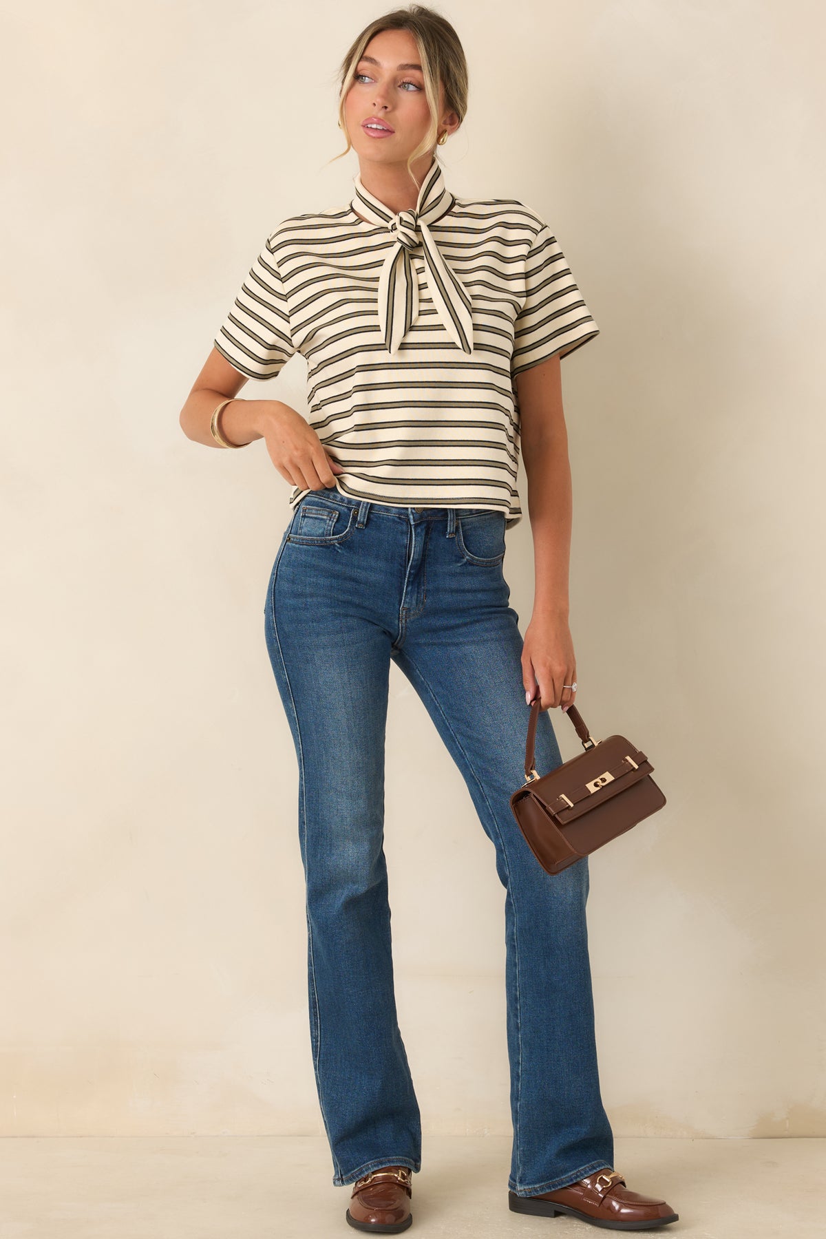 Short sleeve cotton-blend tee with an ivory base, slim olive horizontal stripes, comfortable stretch, and an effortless everyday silhouette.
