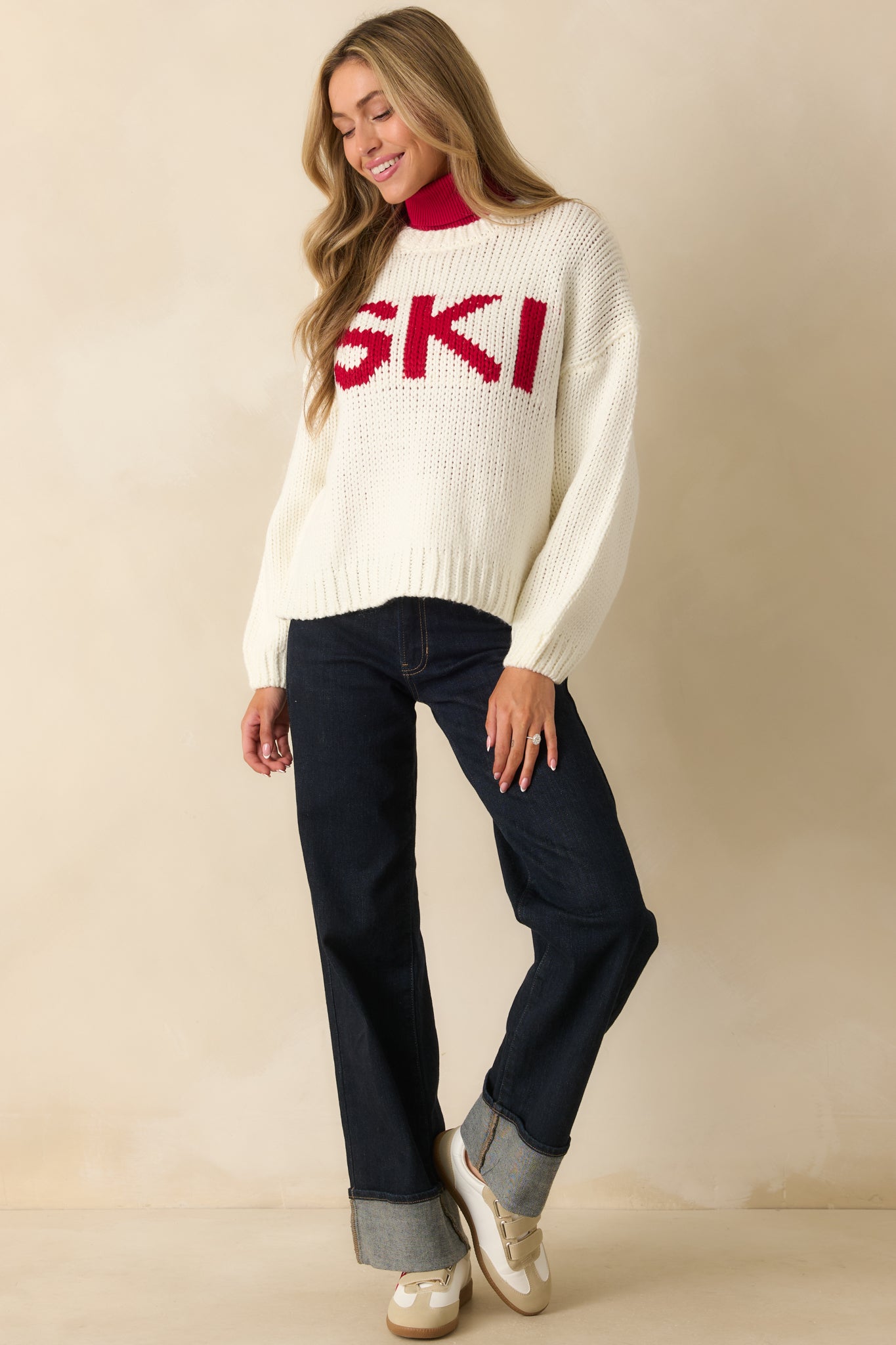 Straight-on full-body view emphasizing the sweater’s cozy relaxed silhouette and clean ribbed trim.

