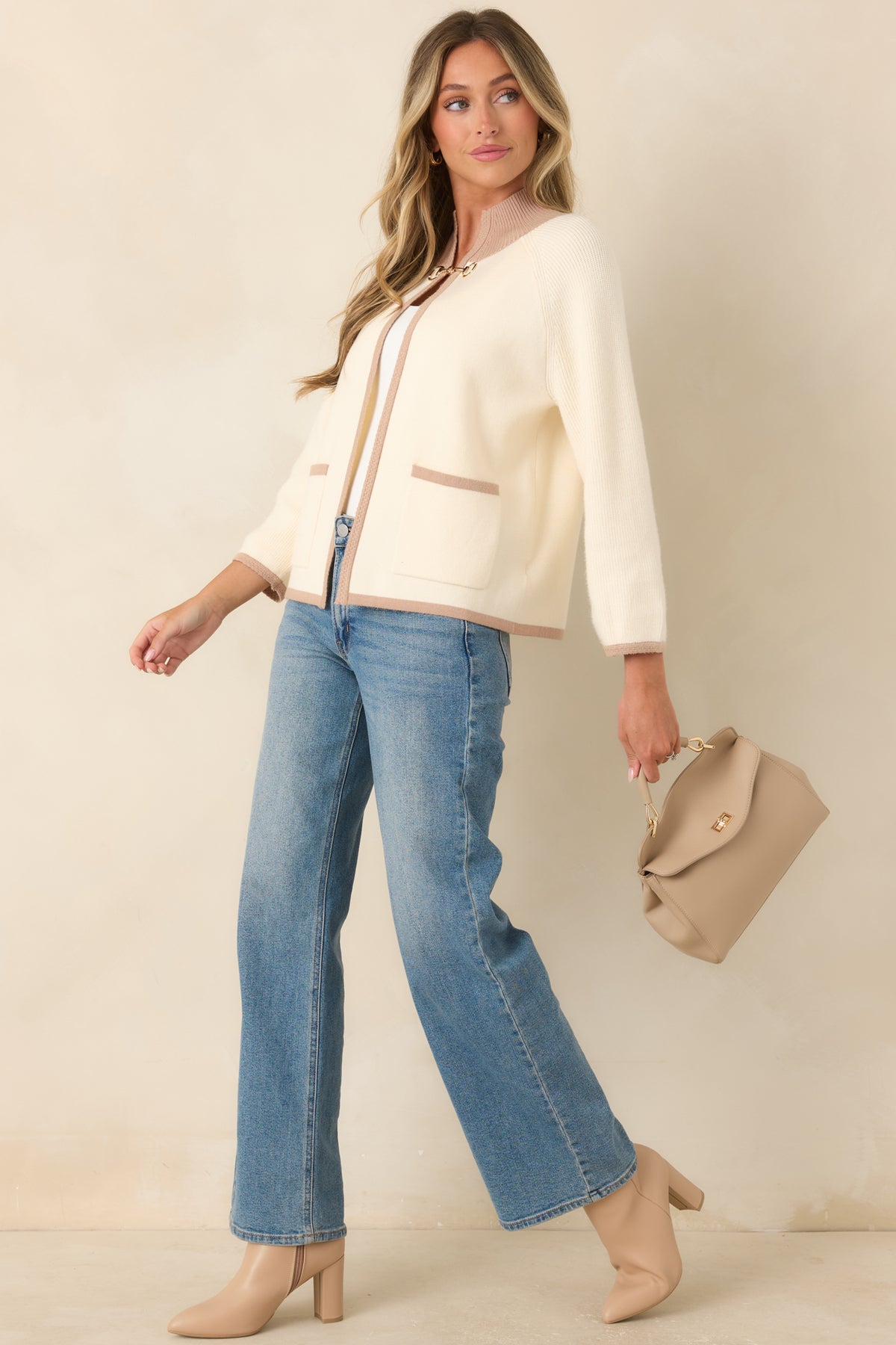 Ivory viscose-blend cardigan showcasing a relaxed silhouette, taupe-trimmed collar and cuffs, open front, and polished gold-tone hardware.