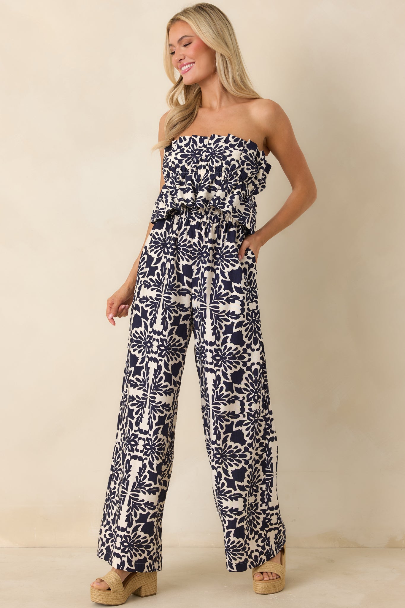 Jumpsuit with functional side pockets and breathable fabric blend.