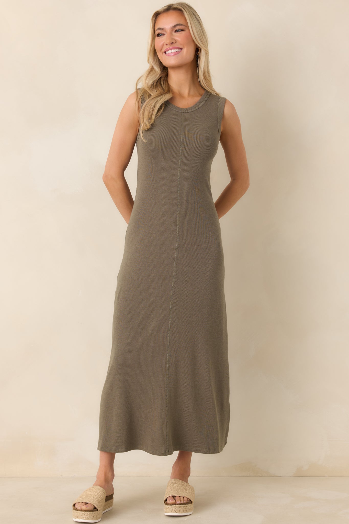 Khaki green sleeveless maxi dress in slub rib knit featuring a classic crew neckline and gently fitted bodice.