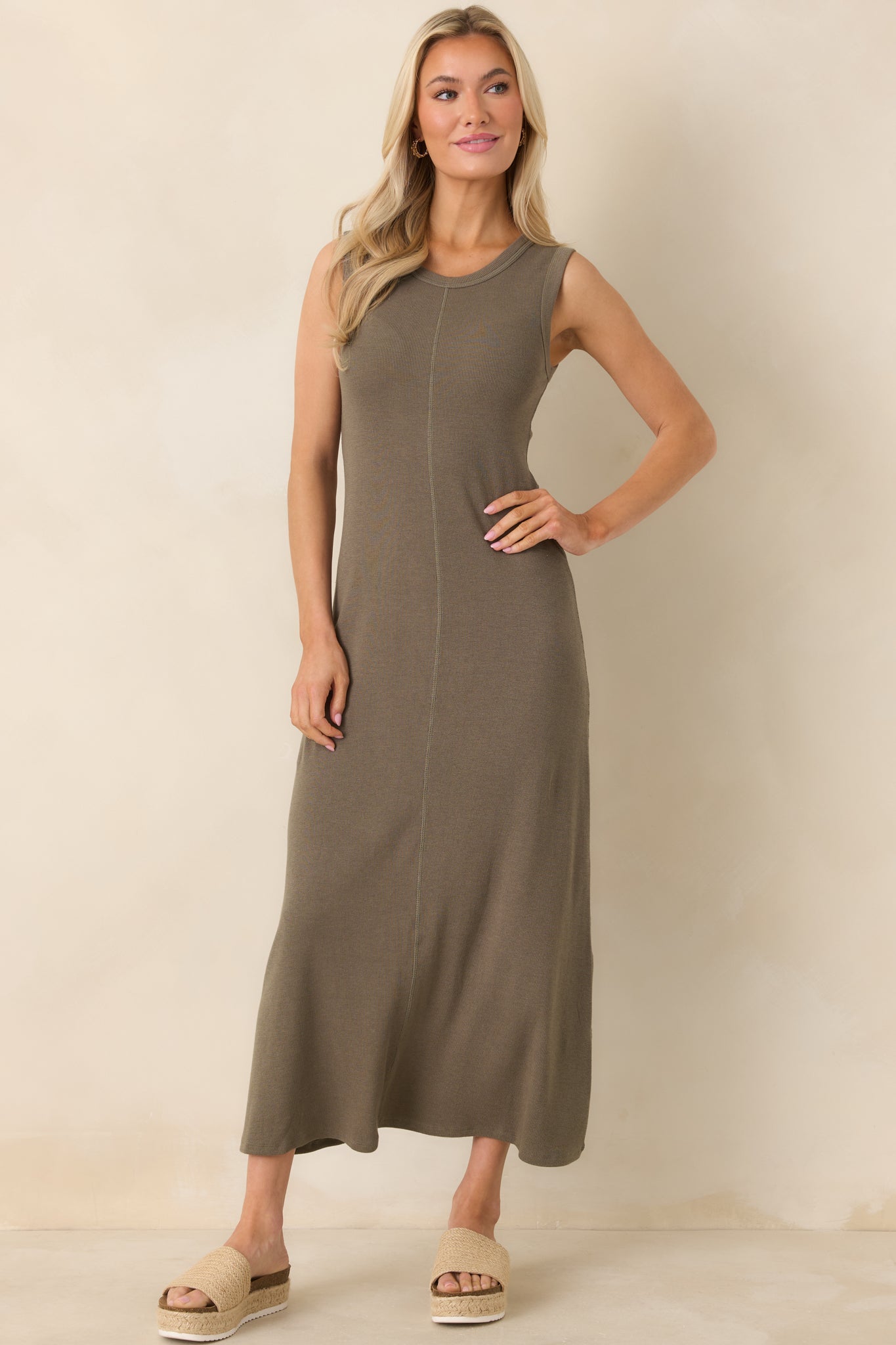 Khaki green sleeveless maxi dress in slub rib knit featuring a classic crew neckline and gently fitted bodice.