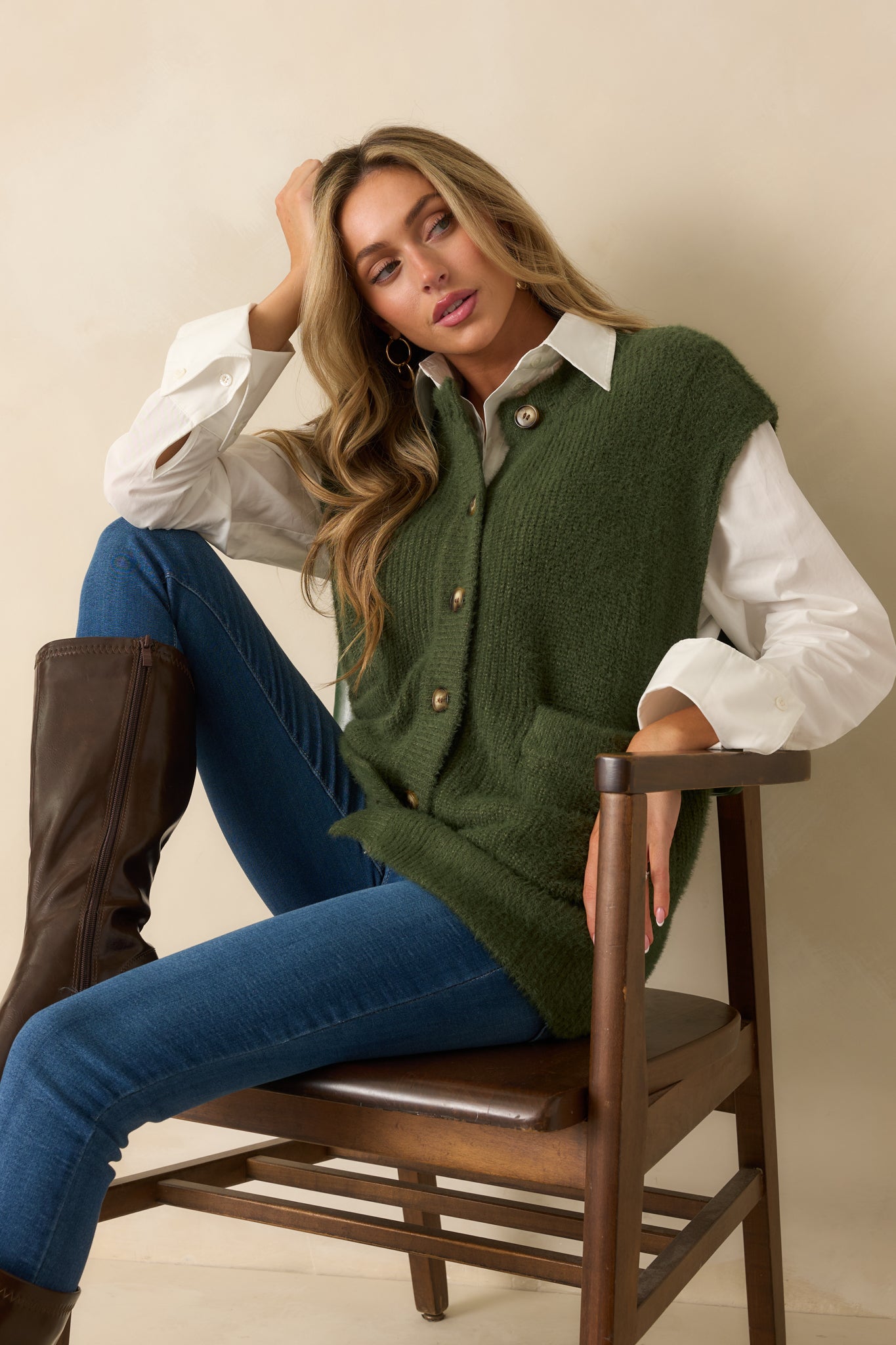 Knit cardigan styled to show the flowy silhouette and smooth texture.