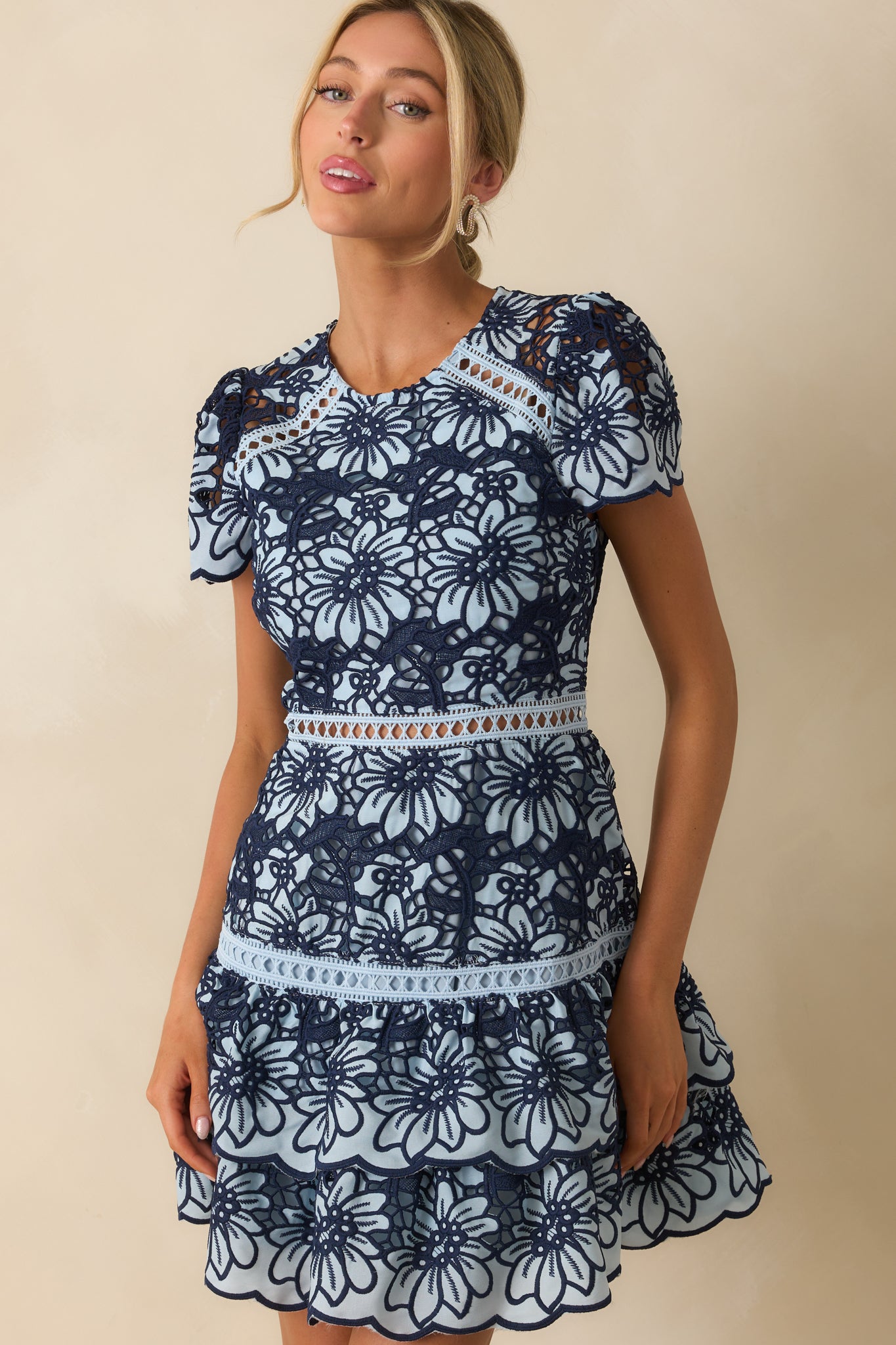 Lace overlay design shown with intricate navy and light blue floral pattern.