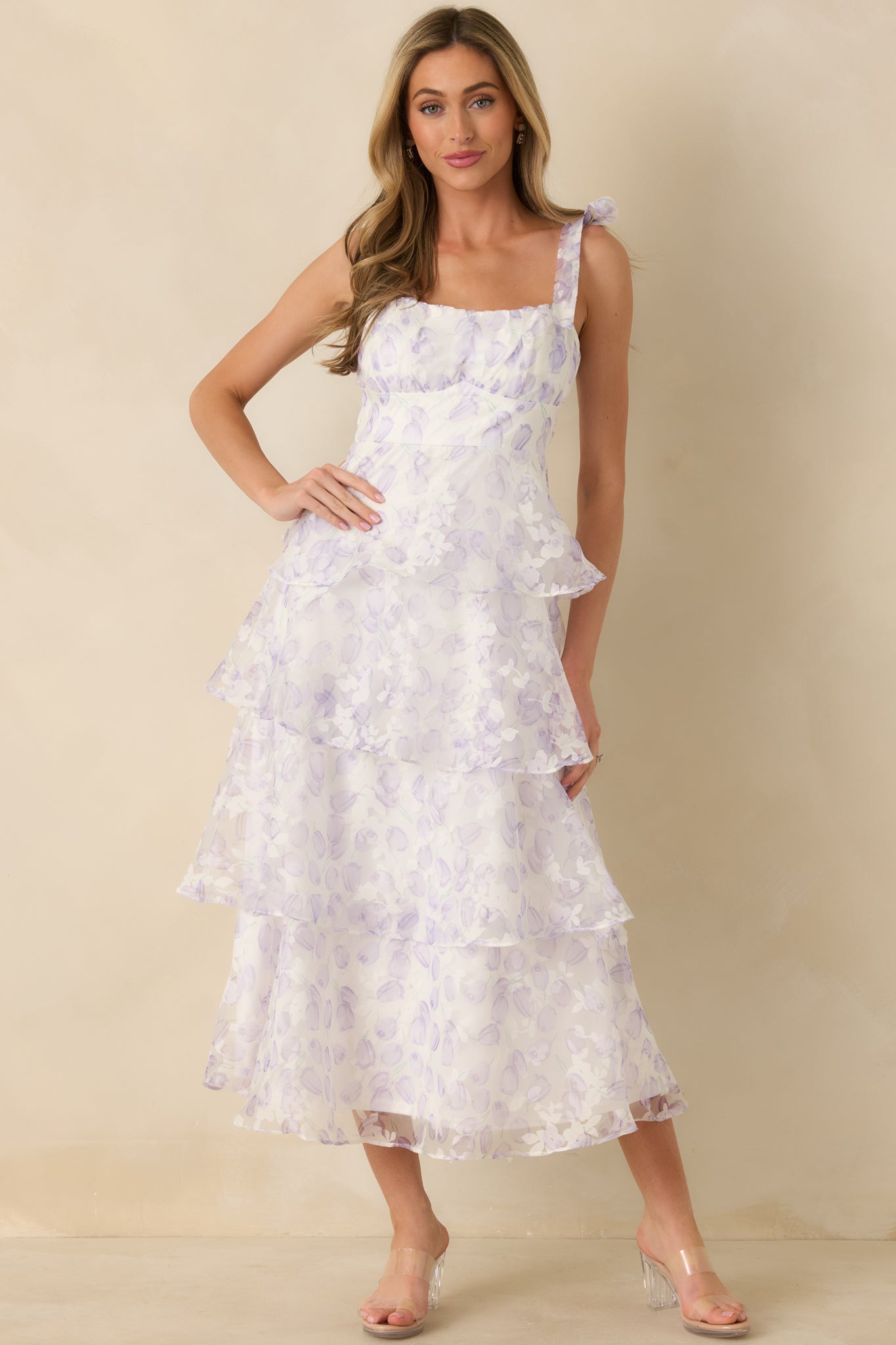 Full body image of the lavender floral tulle midi dress highlighting the soft structure and layered silhouette.