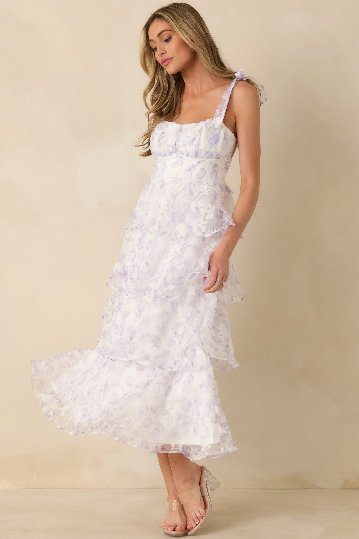 Full angled view of the lavender midi dress showcasing the airy tulle overlay and graceful midi length.