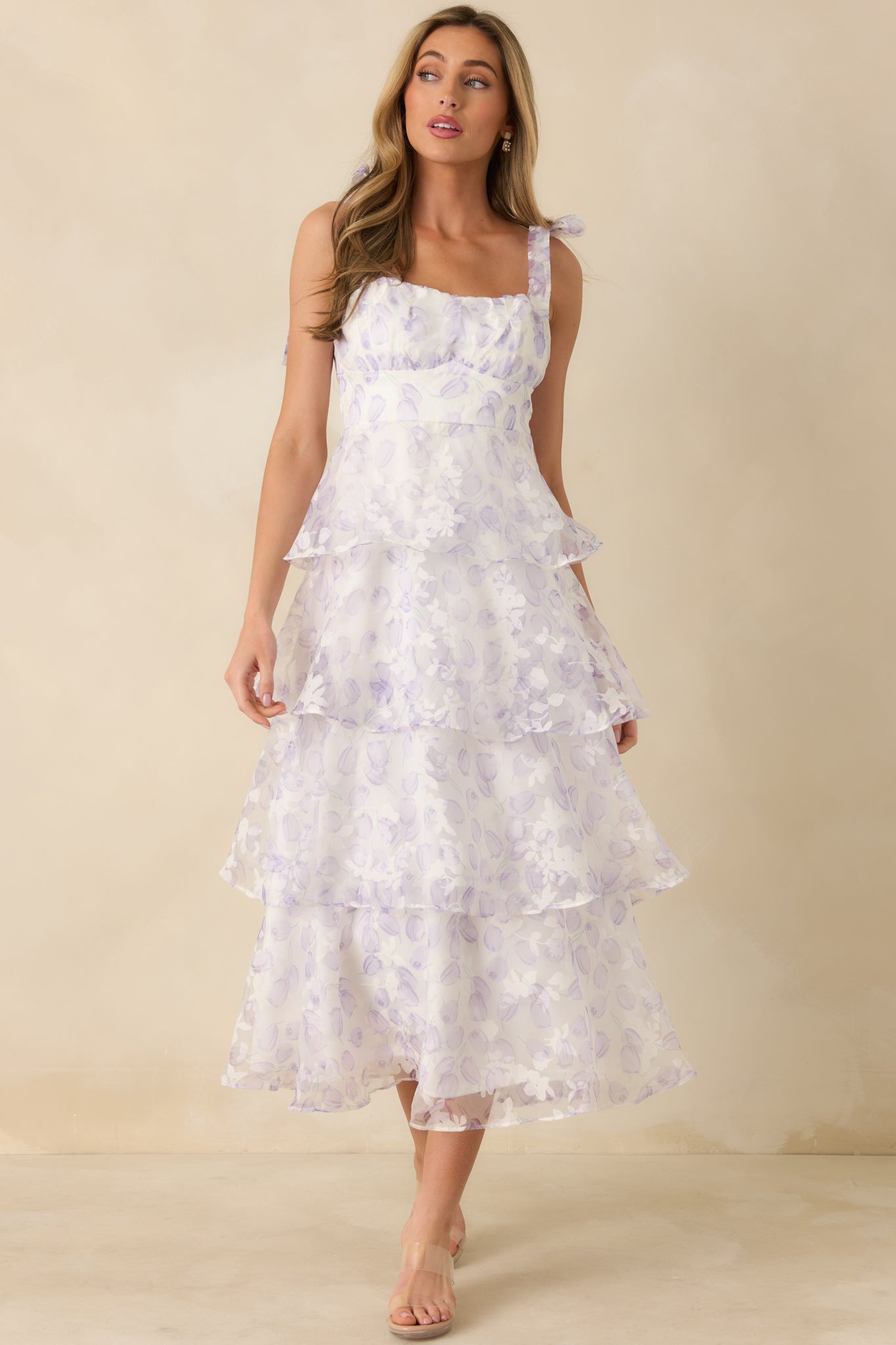 Front view of the lavender midi dress featuring adjustable self-tie bow straps and a romantic sweetheart bodice.
