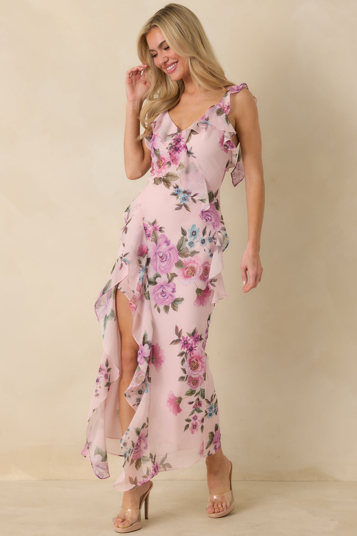 Lavender multi maxi dress designed with a V neckline, ruffled straps, and a full-length flowing hem.