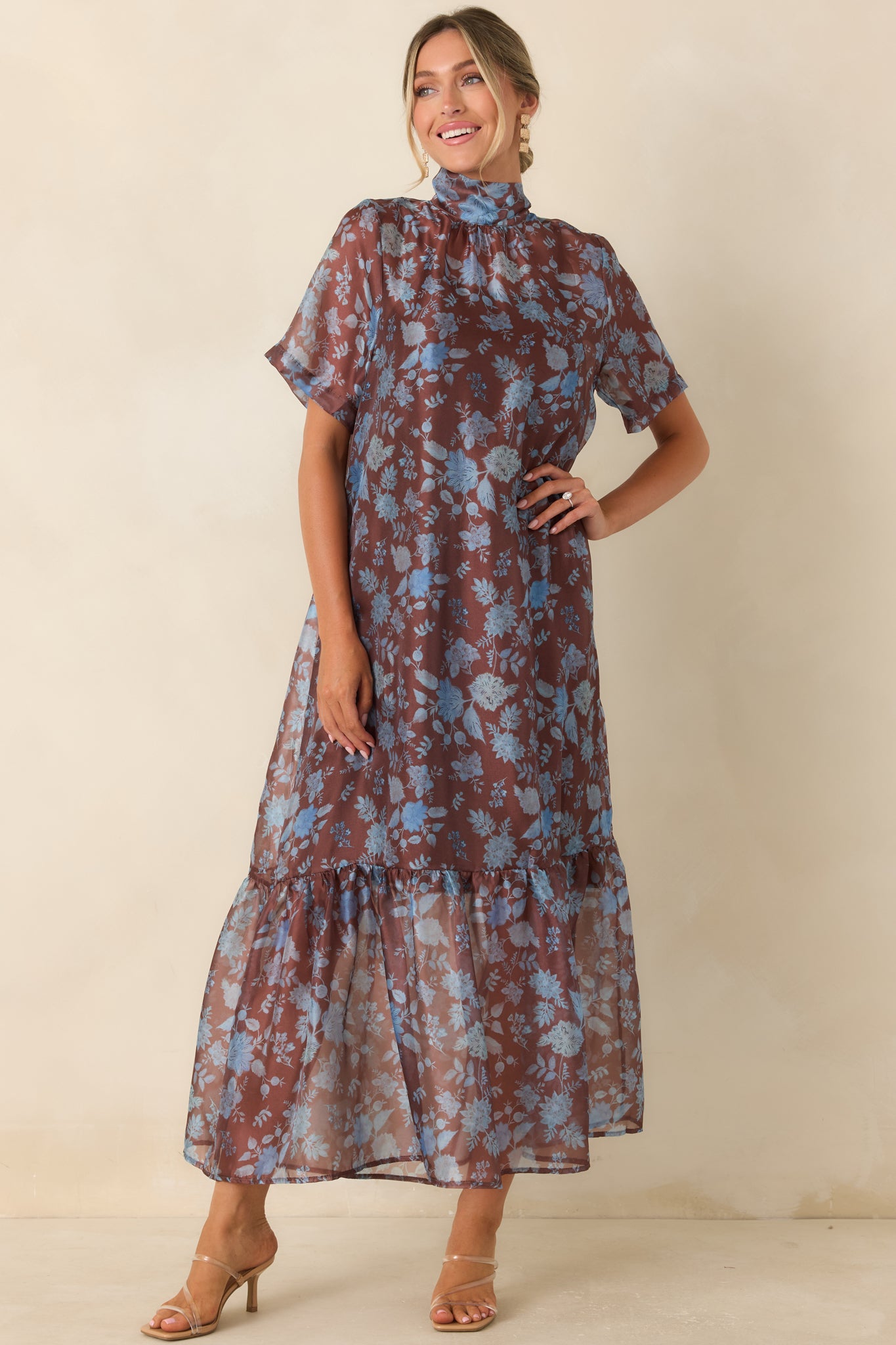 Layered floral maxi dress with a fully lined slip, delicate printed fabric, and a softly flared silhouette.