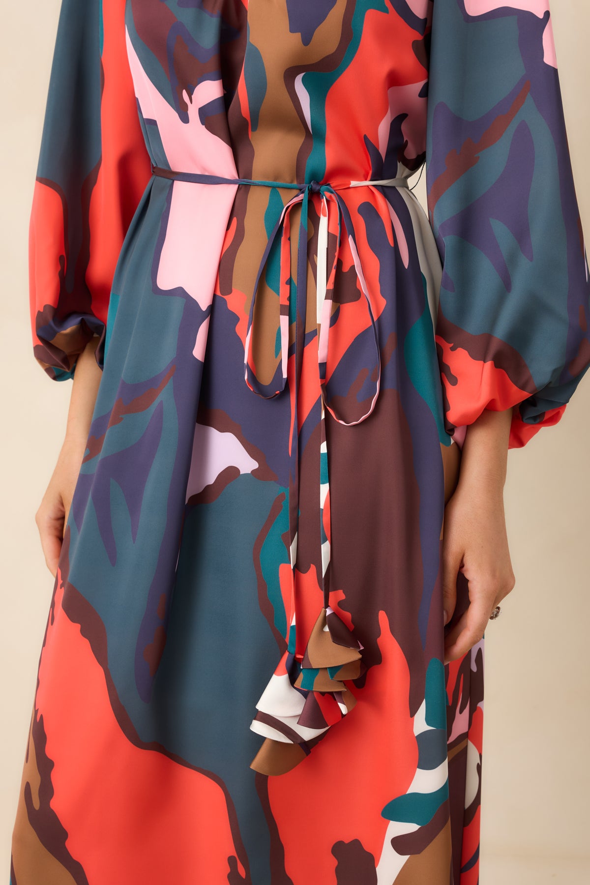 Gathered V-neckline and oversized botanical shapes highlight the colorful Leaf Study print.