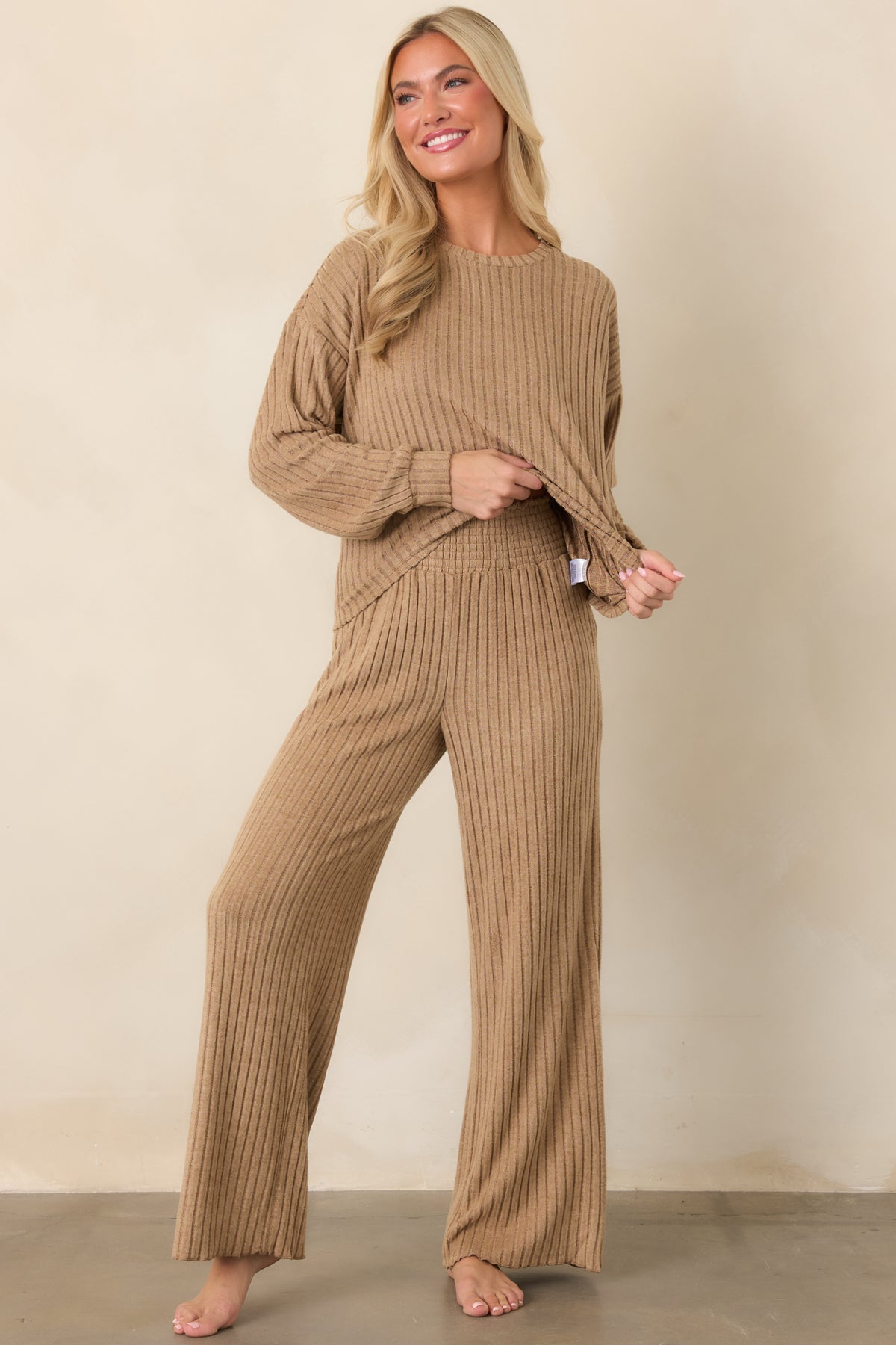 Light toffee ribbed top showcasing banded cuffs and a comfortable relaxed fit.