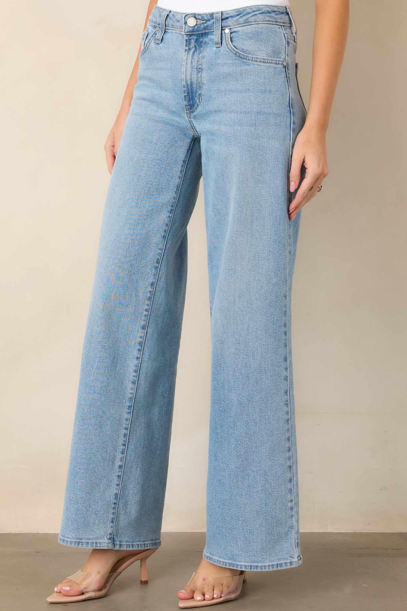 Light-wash denim featuring a wide-leg silhouette designed for an easy, polished look.
