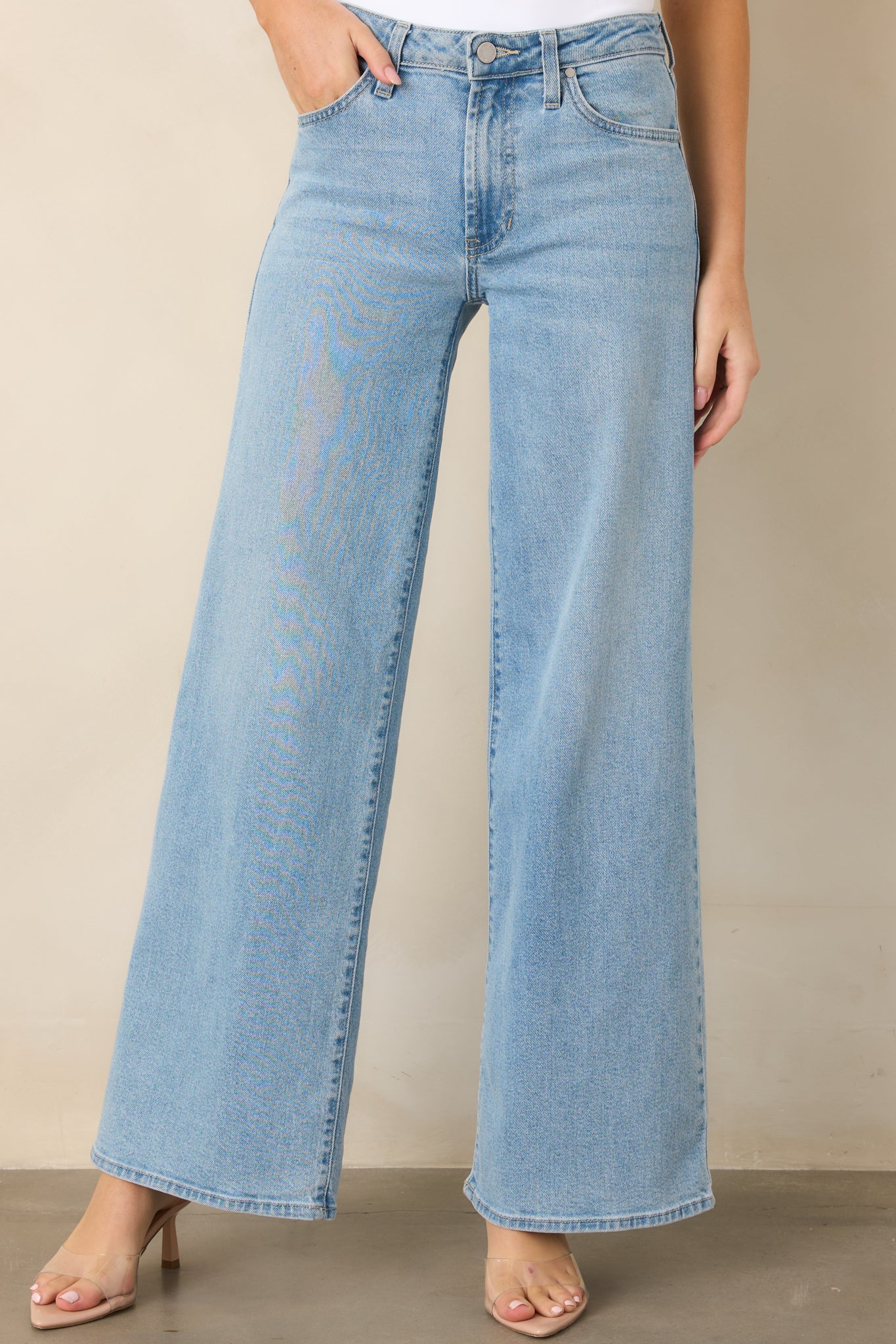 Light-wash jeans highlighting the relaxed wide-leg cut and comfortable waistline.