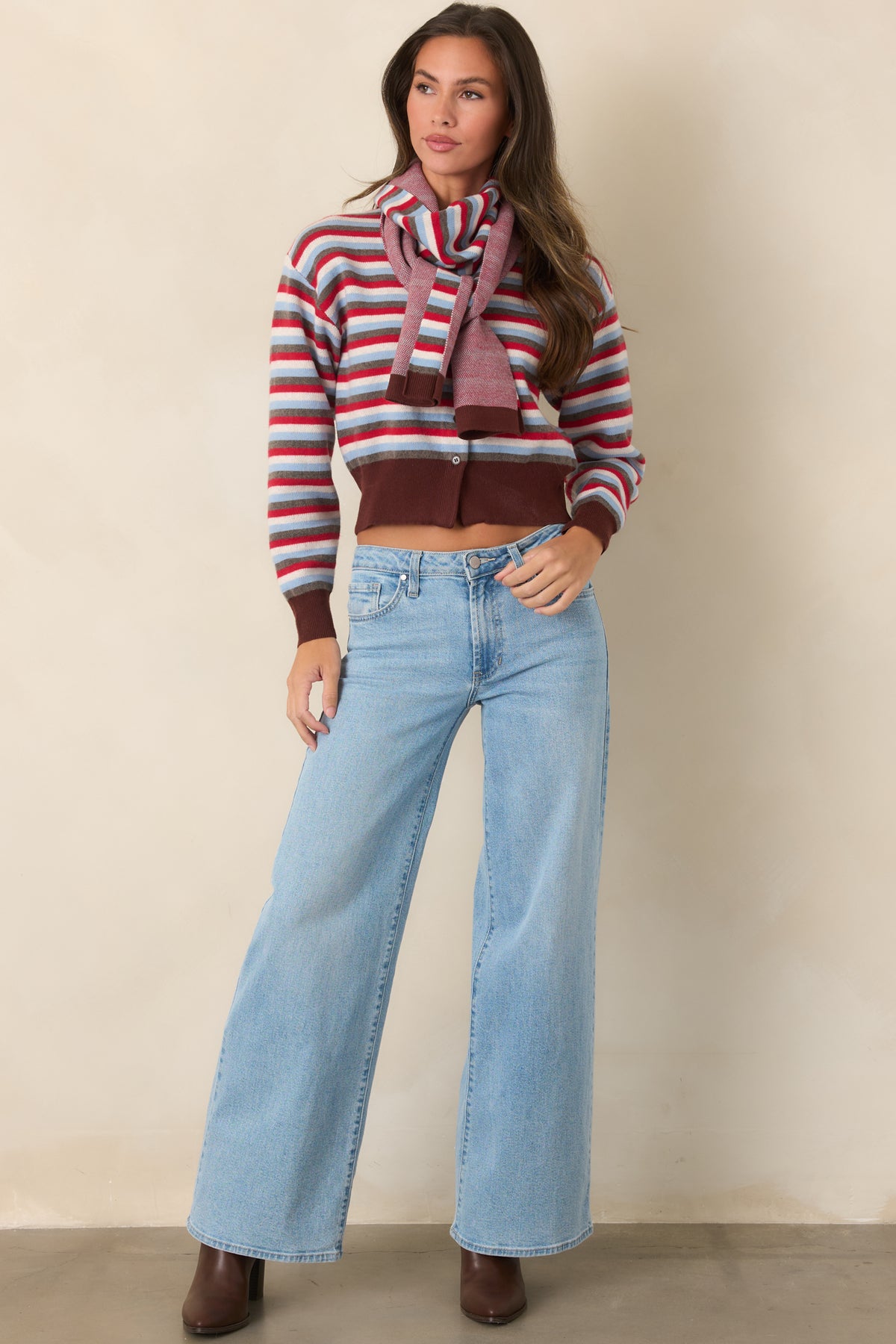 Light wash pants feature a relaxed wide leg silhouette and comfortable waist-high rise.