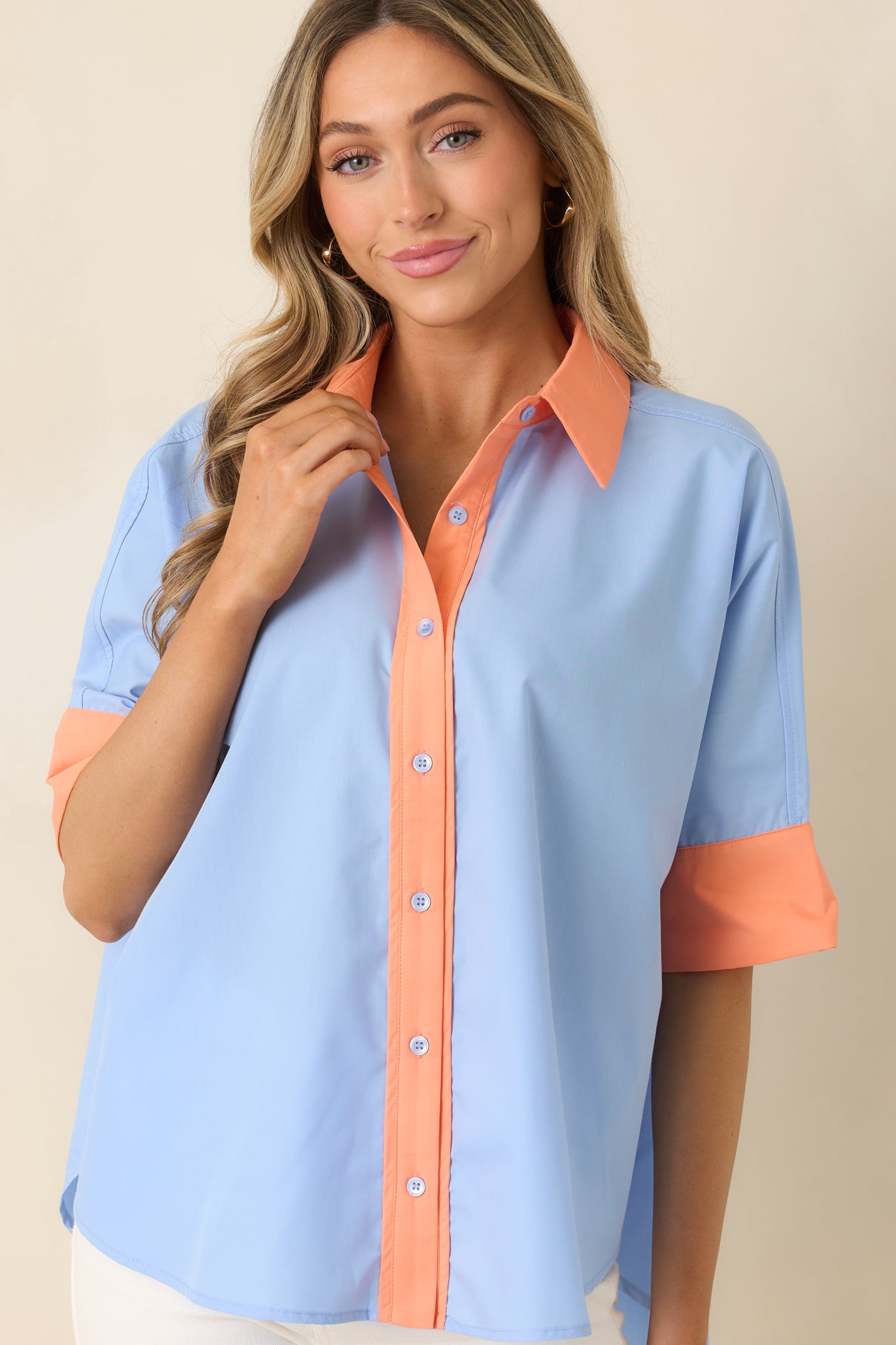 Lightweight button-front top, with a close view of the structured collar and crisp fabric.