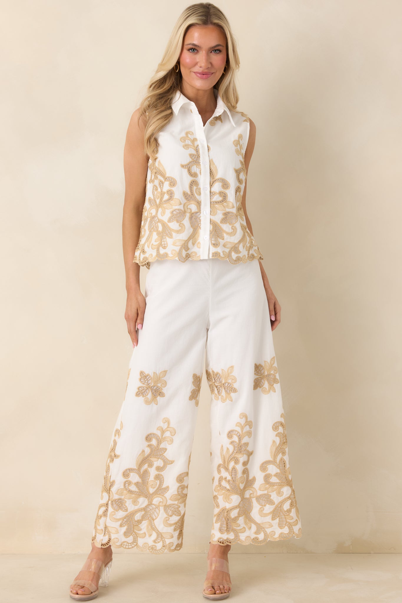 Lightweight cotton ivory top featuring champagne lace appliqué and relaxed fit.