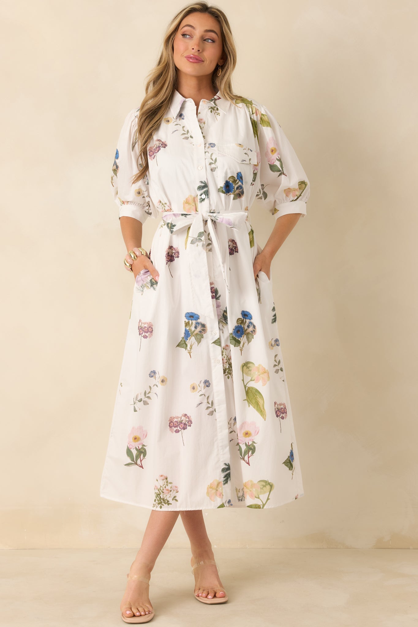 Lightweight woven cotton midi dress blooming in multicolor florals for breathable comfort.