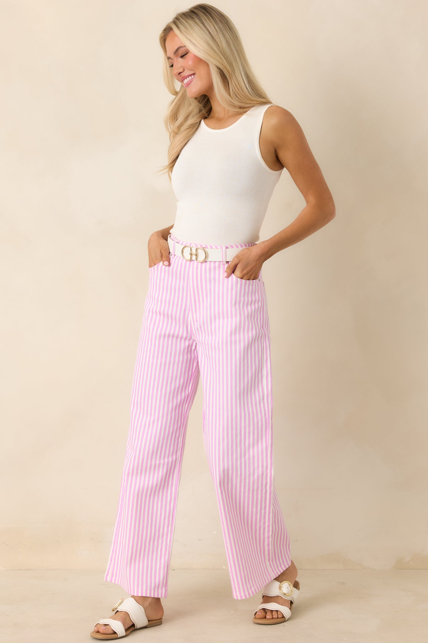 Lightweight cotton pants featuring vibrant stripe pattern and flattering straight shape.
