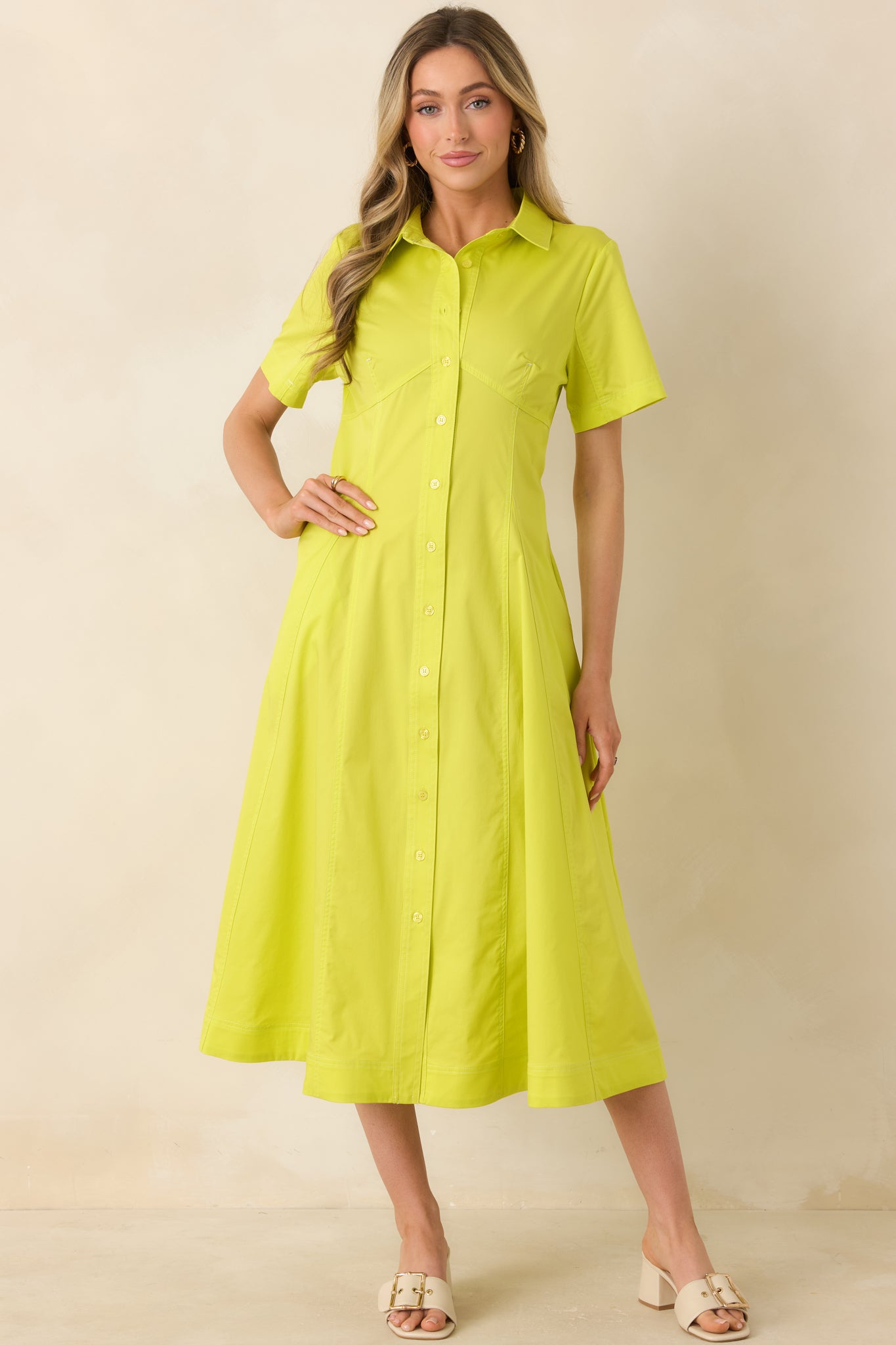 Lightweight dress featuring subtle shaping seams and relaxed fit.
