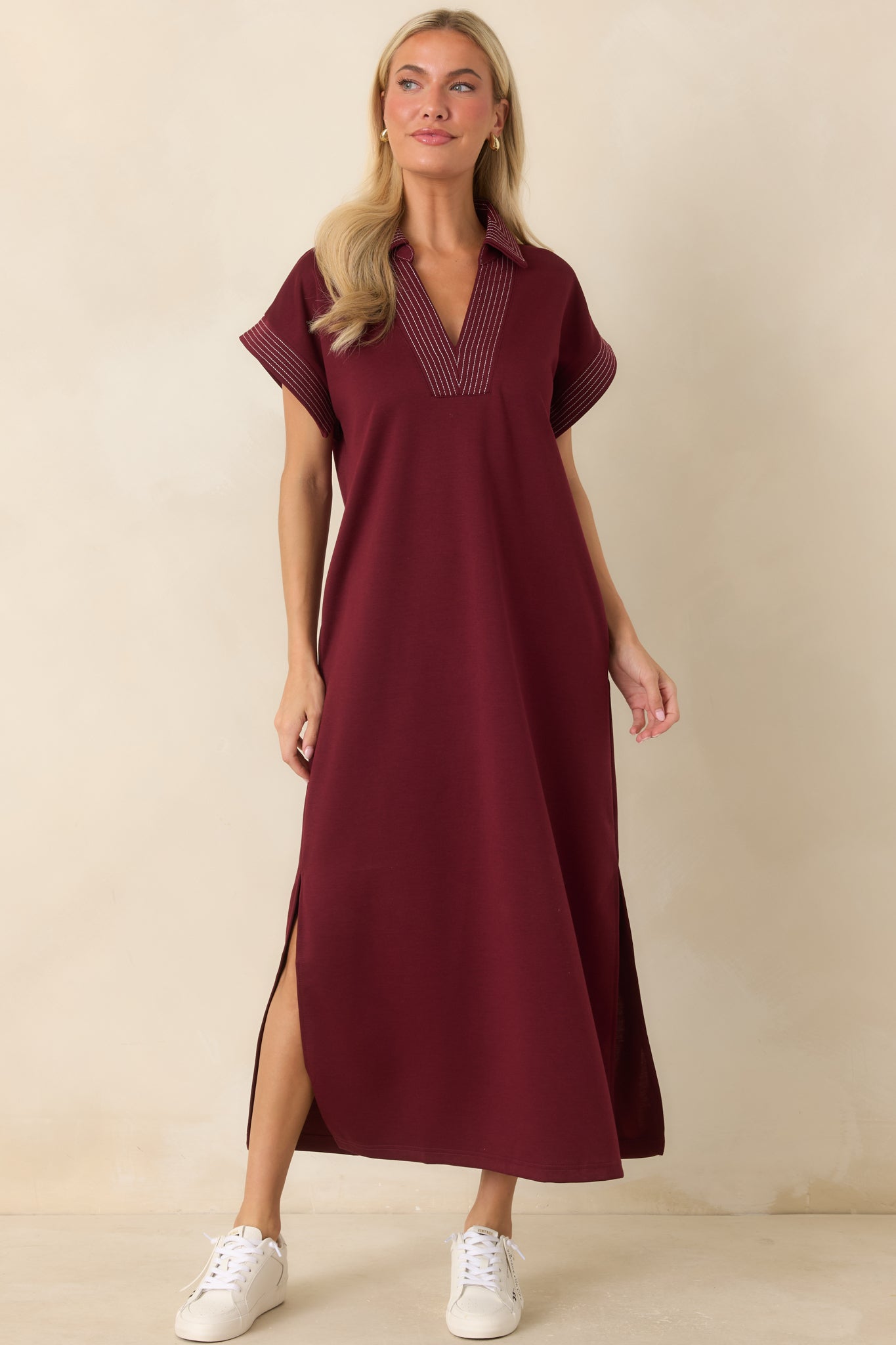 Lightweight dress designed with a V-neck collar, relaxed fit, and effortless movement.