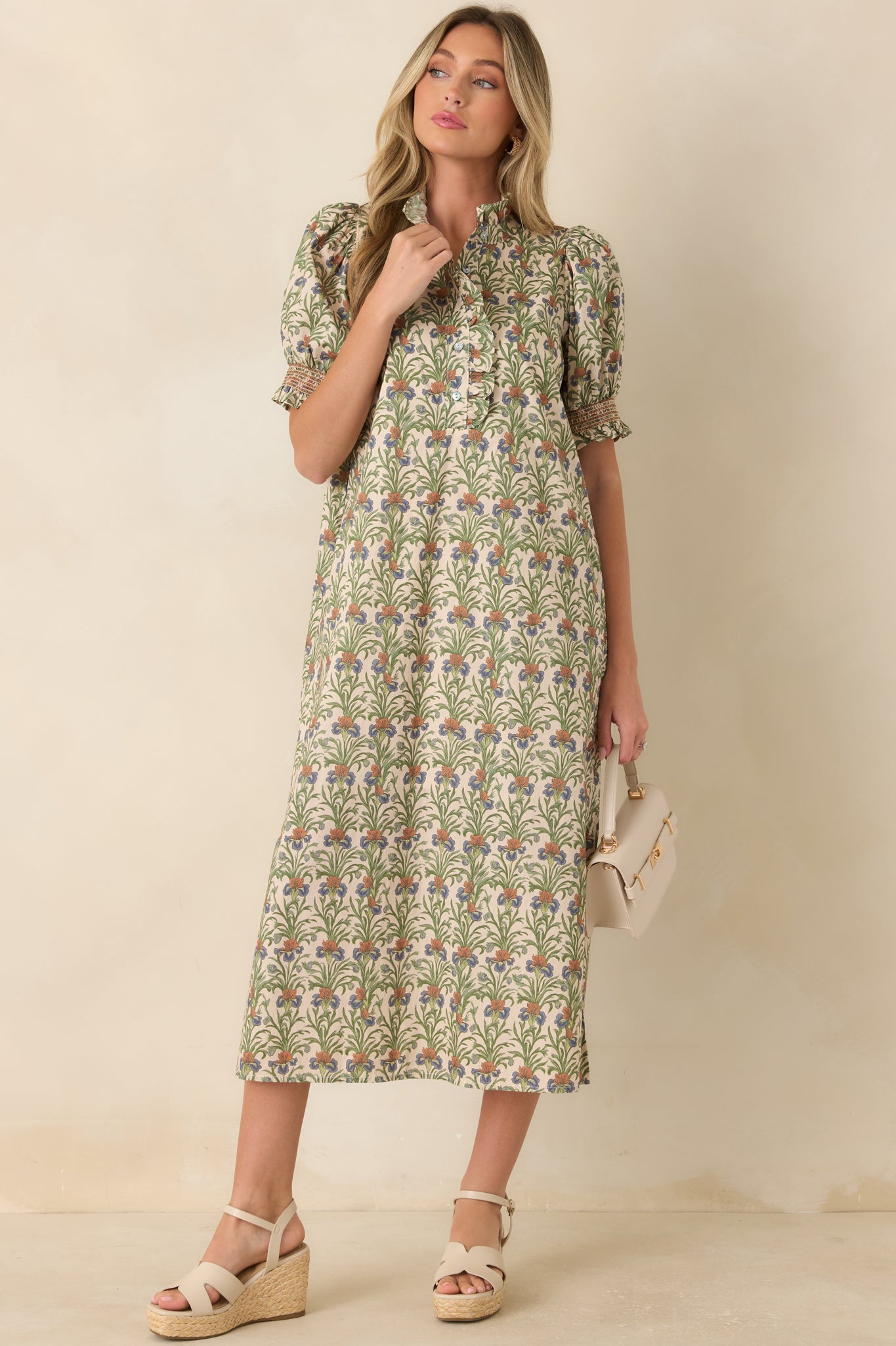 Lightweight ivory midi dress with moss green floral detailing, voluminous puff sleeves, side pockets, and a softly lined A-line skirt