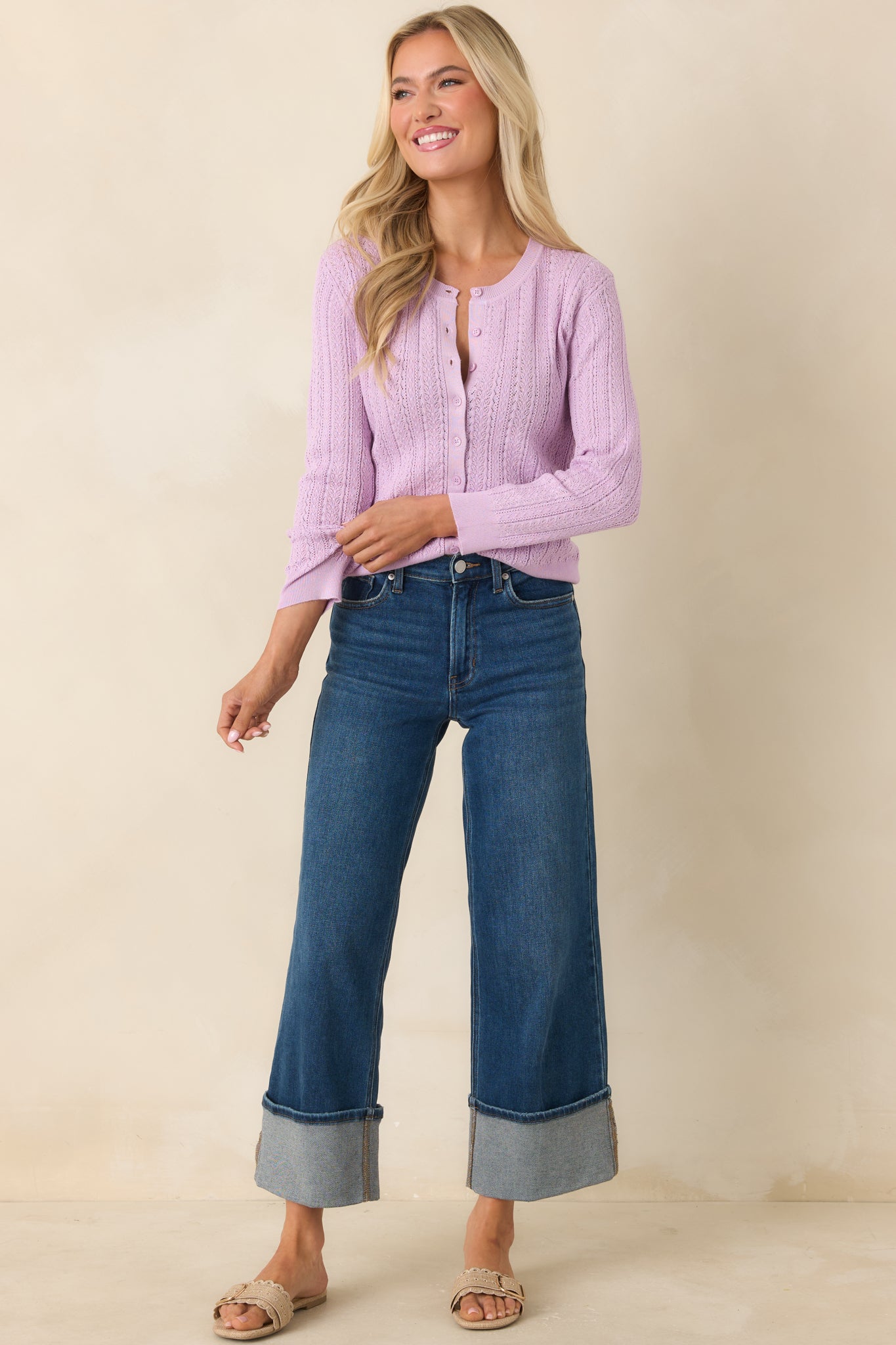 Lightweight knit cardigan, in a lilac hue with a button-front closure and textured finish.