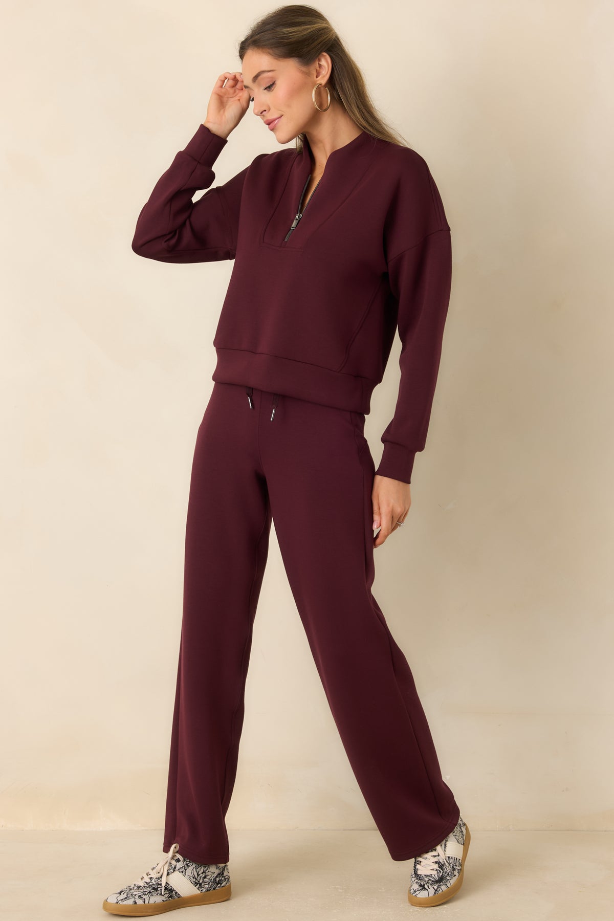 Lightweight straight-leg pants featuring a comfortable pull-on waistband and an easy draped silhouette.