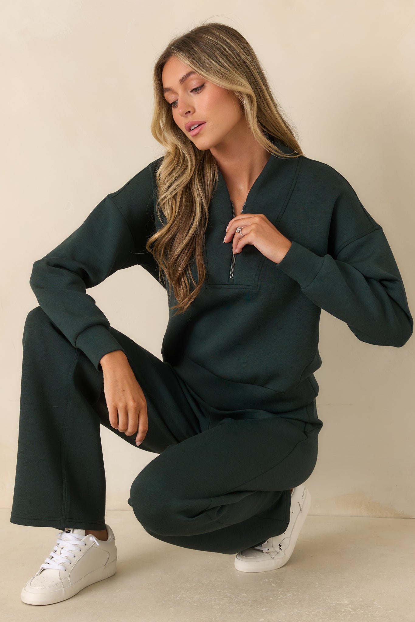 Lightweight spacer fabric top with a silky-smooth finish, long sleeves, and a wide banded hem.