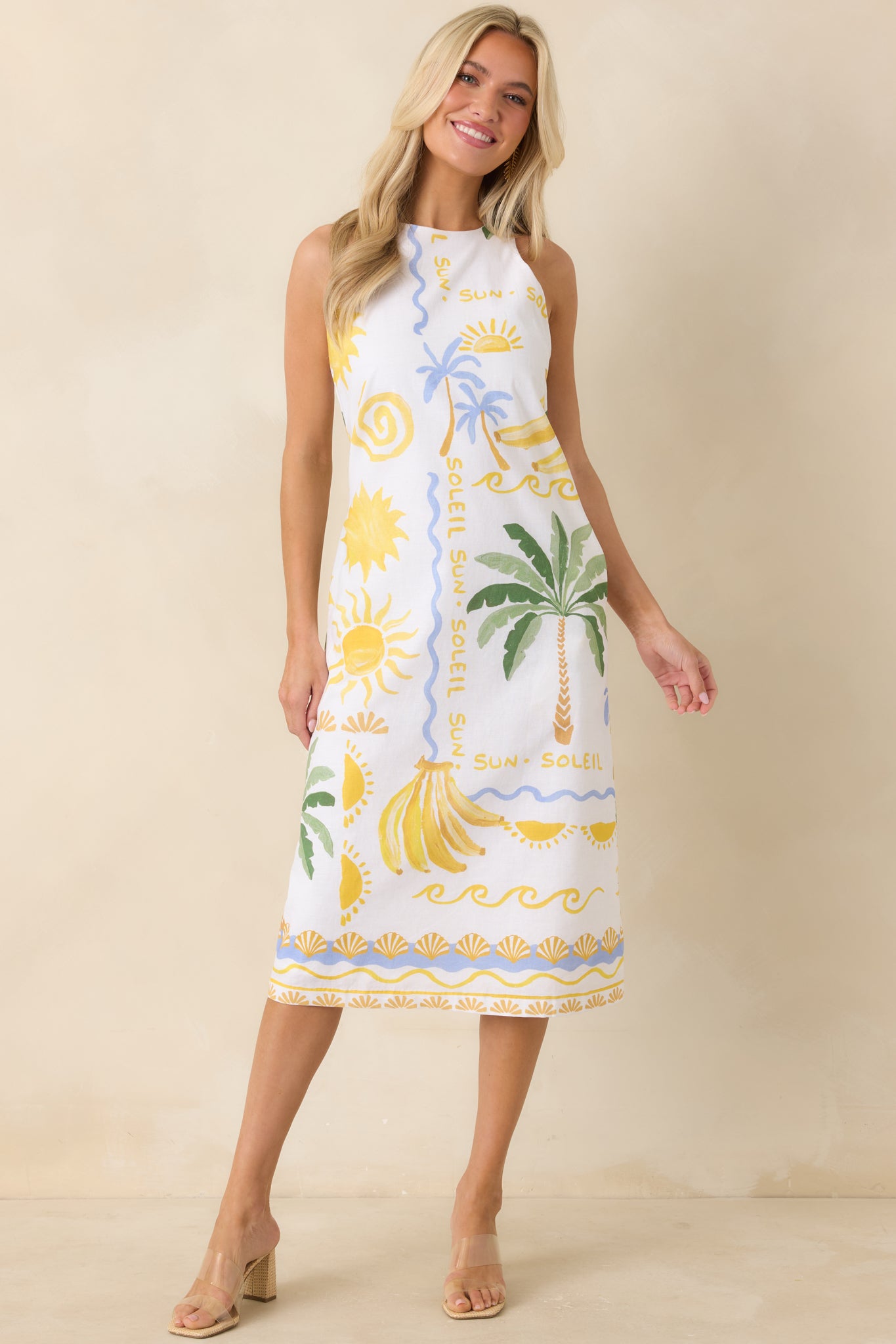 Full view of the lightweight tank top showcasing a breezy fit and clean square neckline balanced by bold tropical-inspired print details.