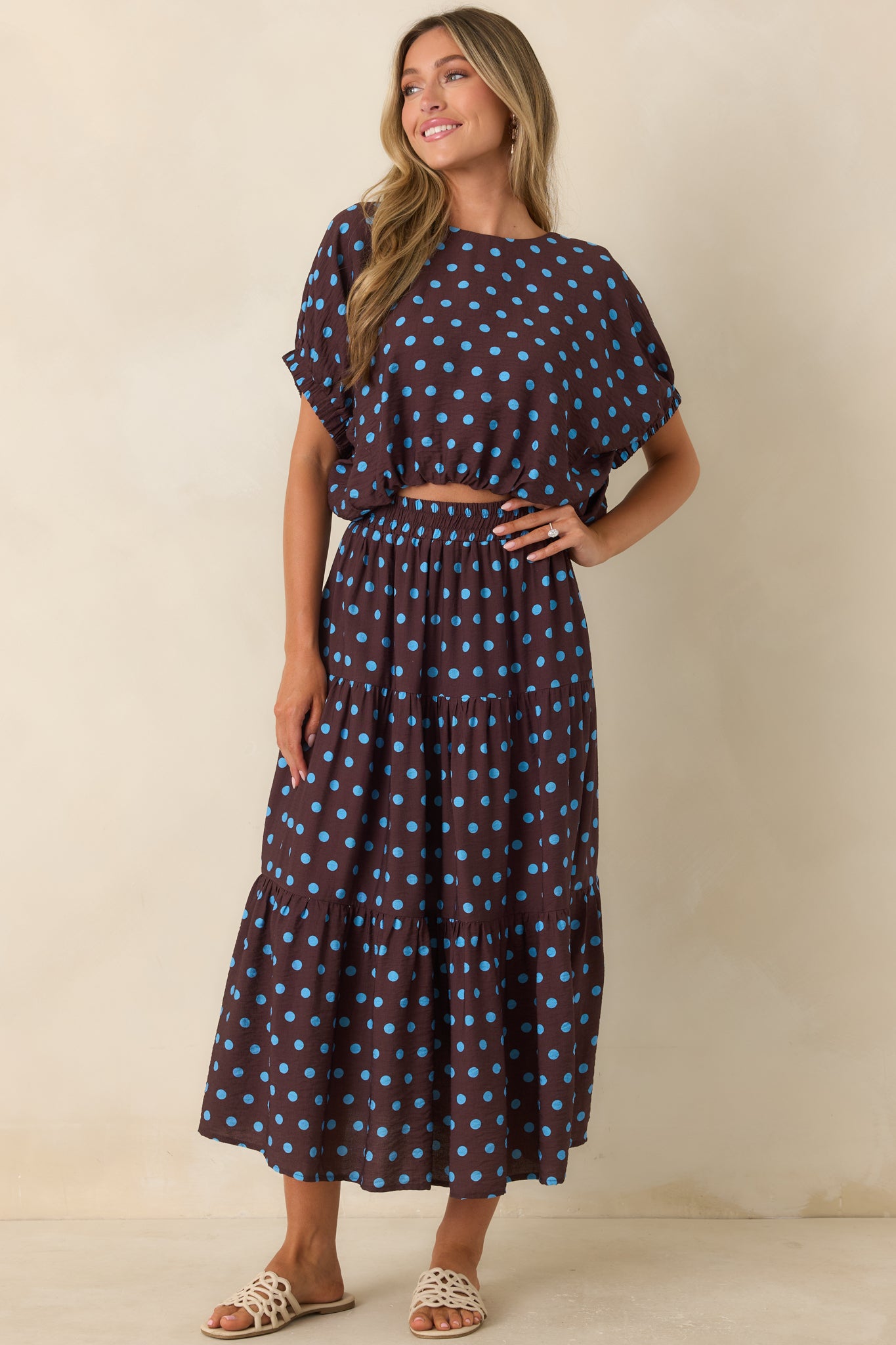 Lightweight viscose blend top showcasing a smooth lined finish, elastic cuffs, and a comfortable gathered hem.