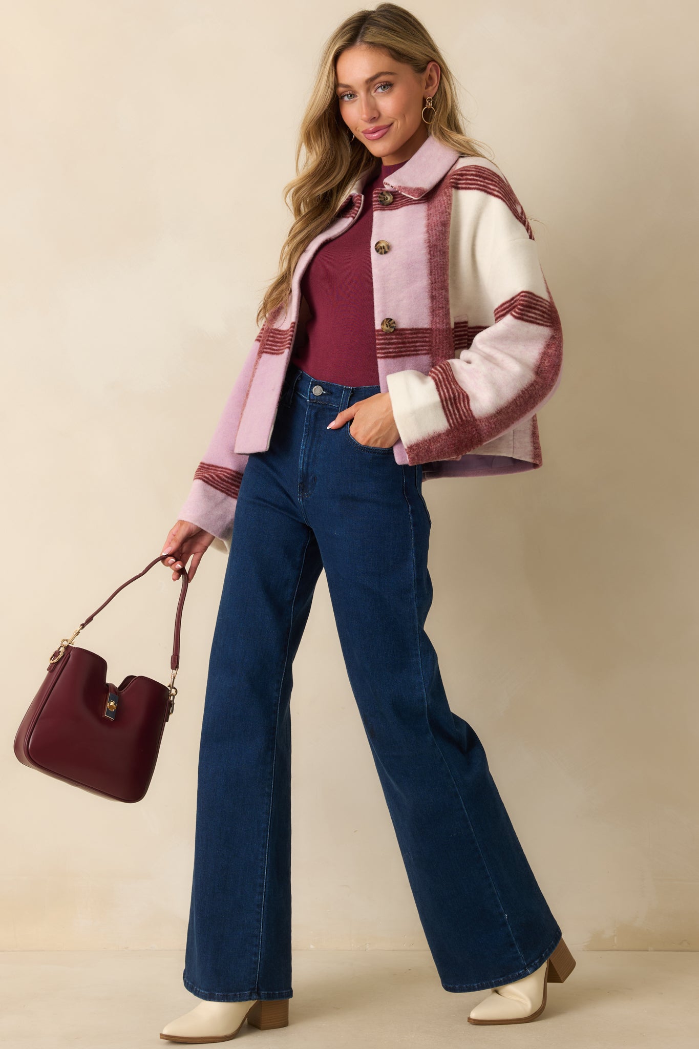 Lilac plaid wool-blend jacket shown worn open, revealing its smooth lining and laid-back, boxy shape.