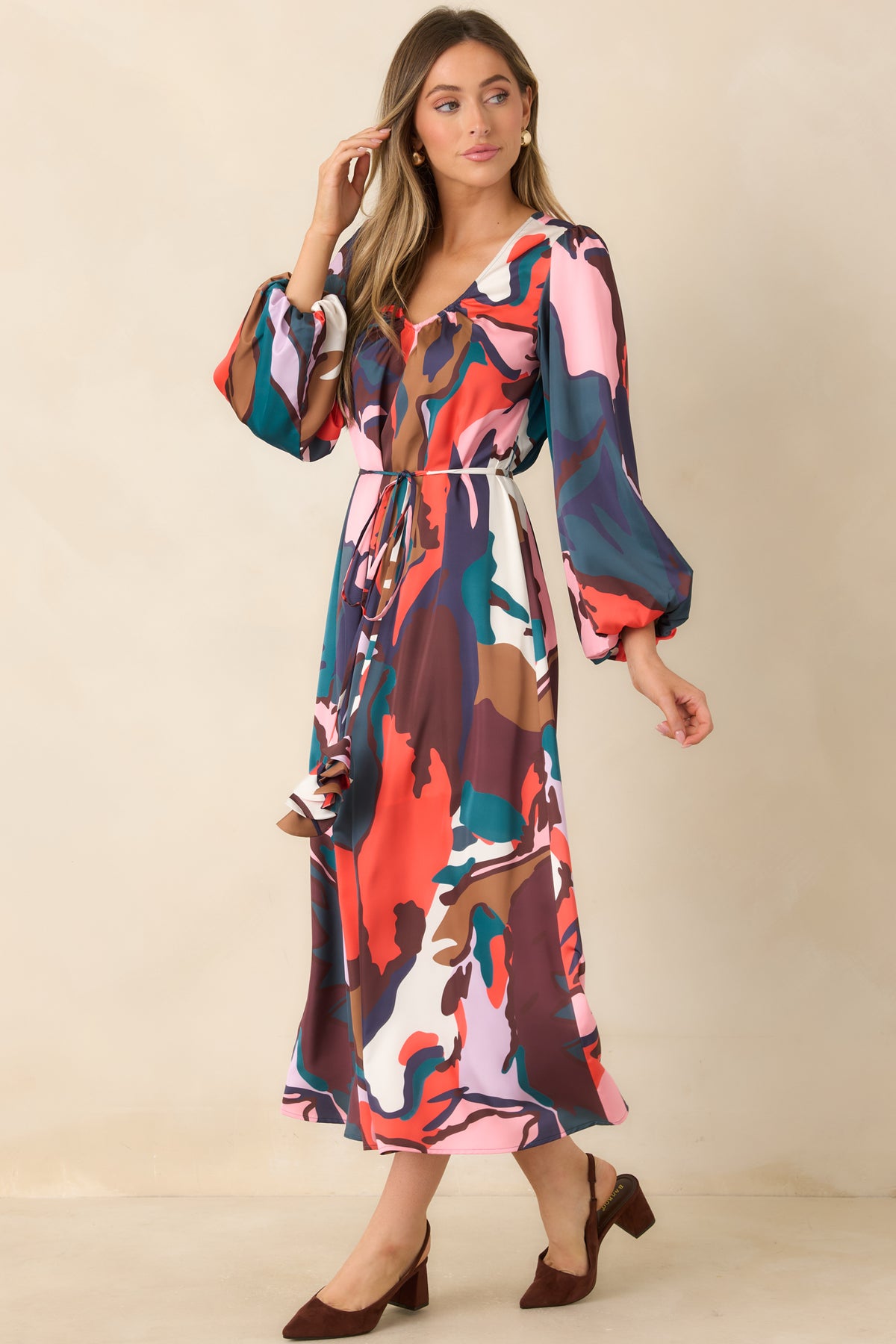 Lined botanical print midi dress with a softly gathered neckline, wide three-quarter sleeves, and a fluid skirt.