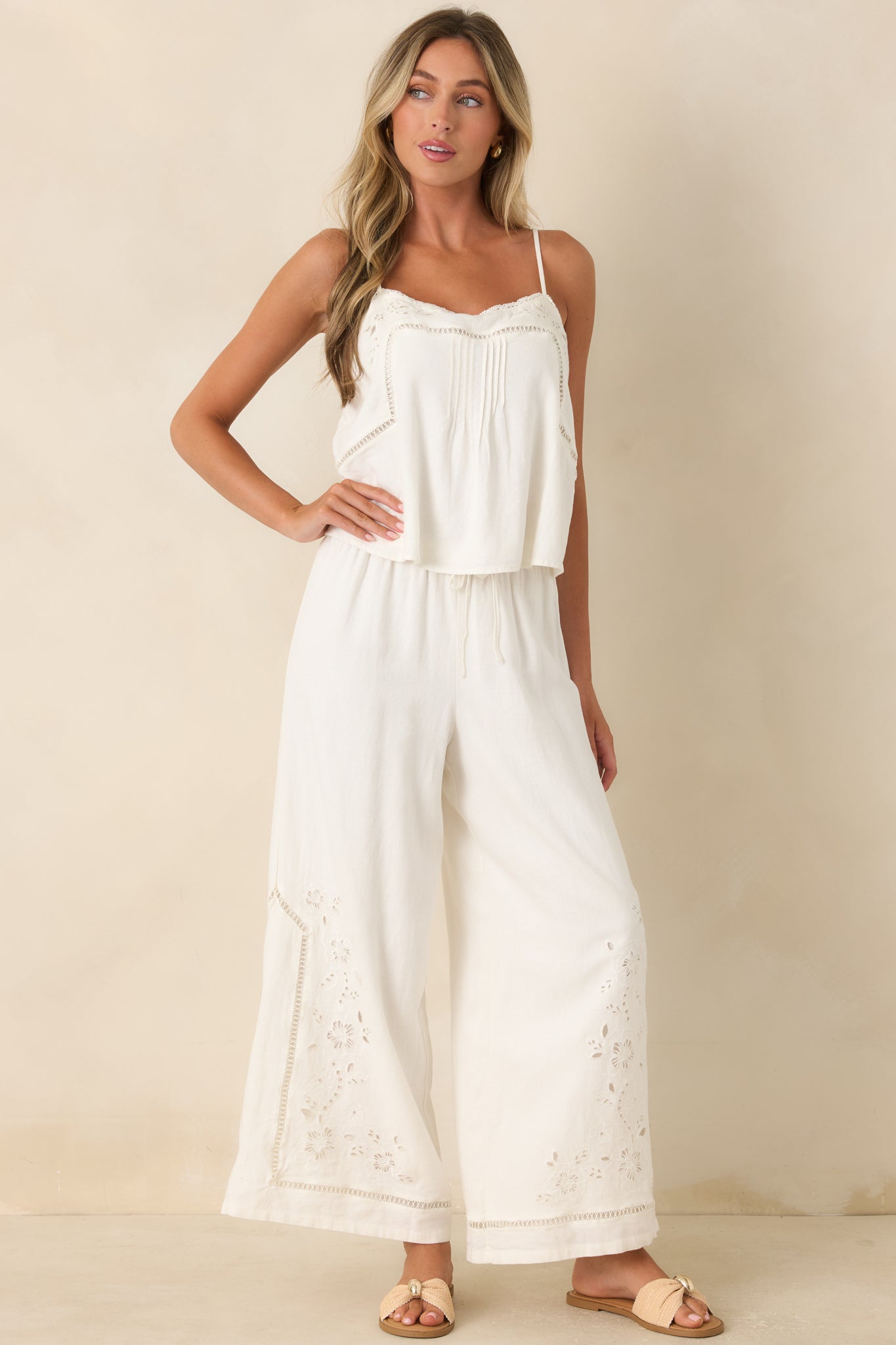 Linen blend tank top with intricate floral embroidery, openwork accents, and a softly structured square neckline.