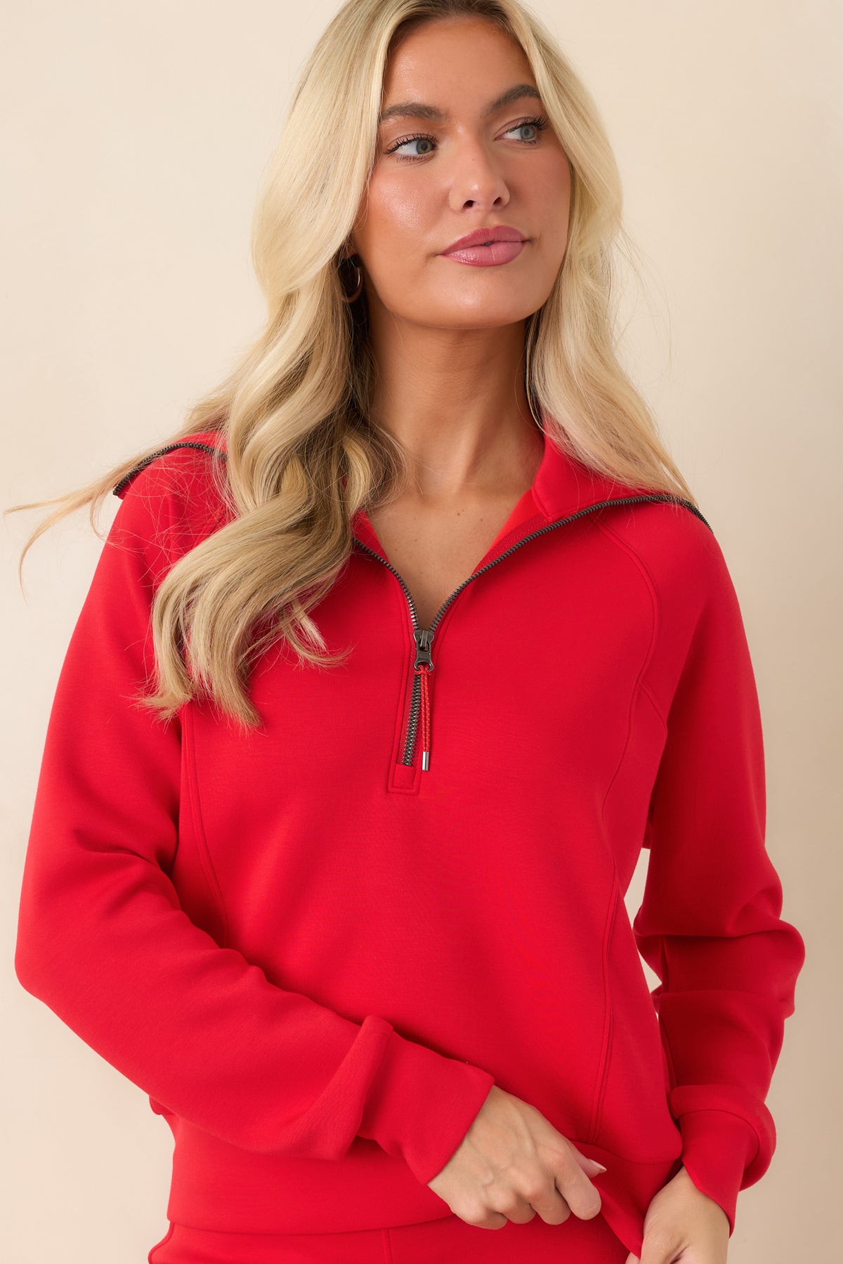 Coordinating cuffs and a relaxed fit define this long sleeve pullover with four-way stretch.