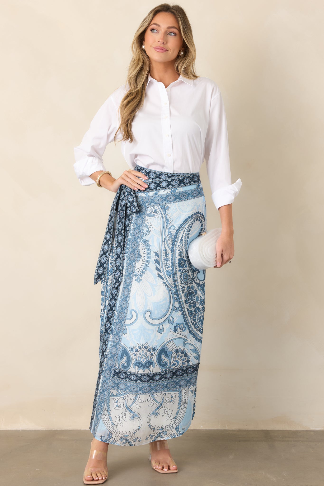Long wrap skirt with a softly flowing shape, decorative border print, and comfortable cotton-lined construction.