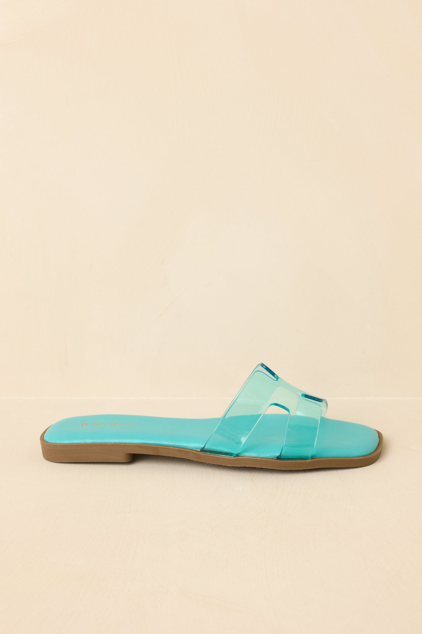 Low-angle view highlighting flat profile and lightweight design.