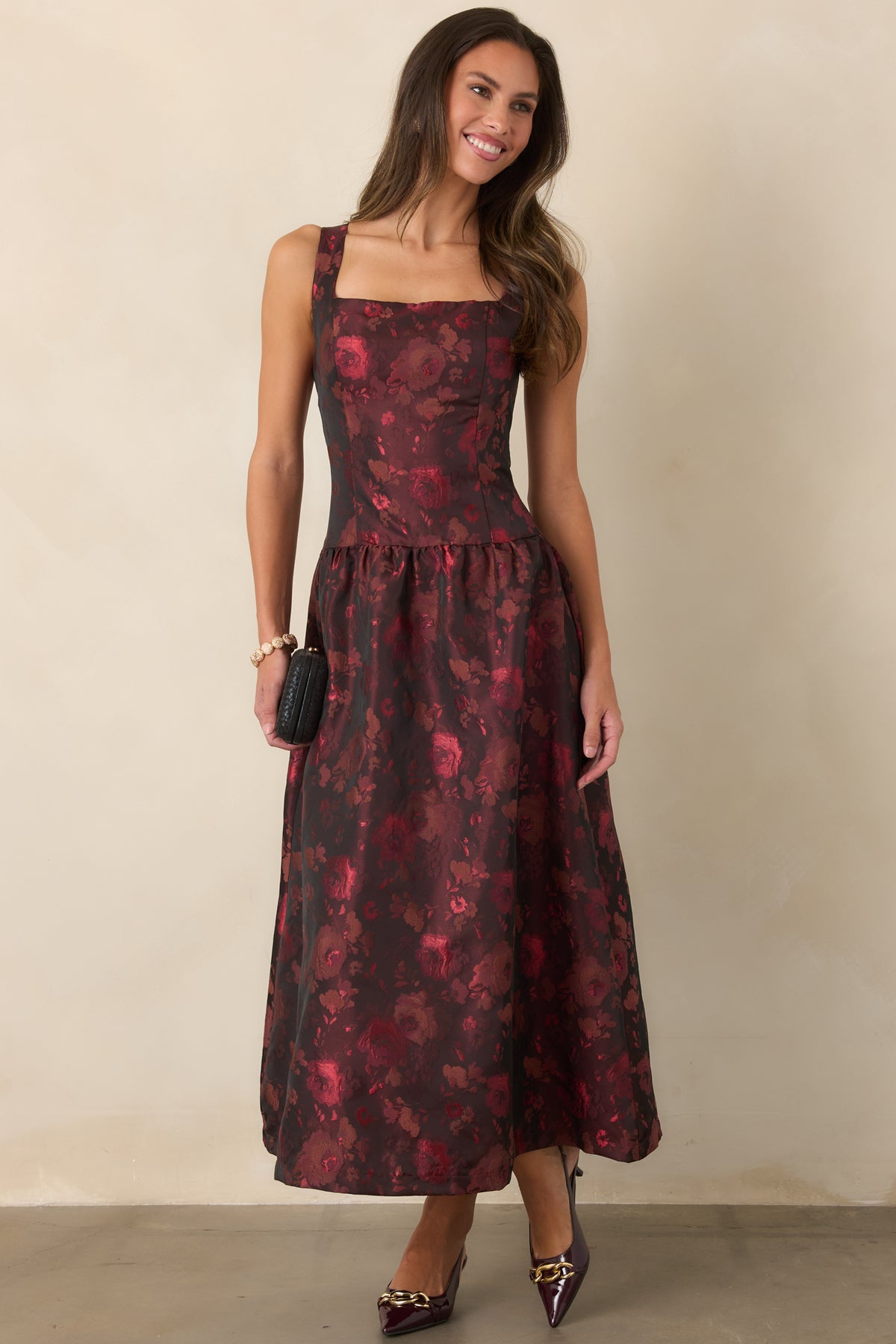 Floral dress featuring a softly lustrous finish and classic fit-and-flare silhouette.