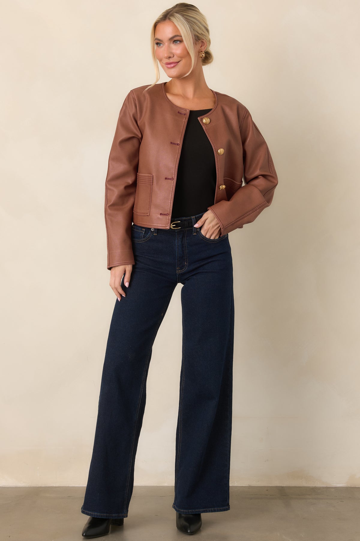 Mauve cropped jacket with long sleeves, clean edges, and a polished front button closure.