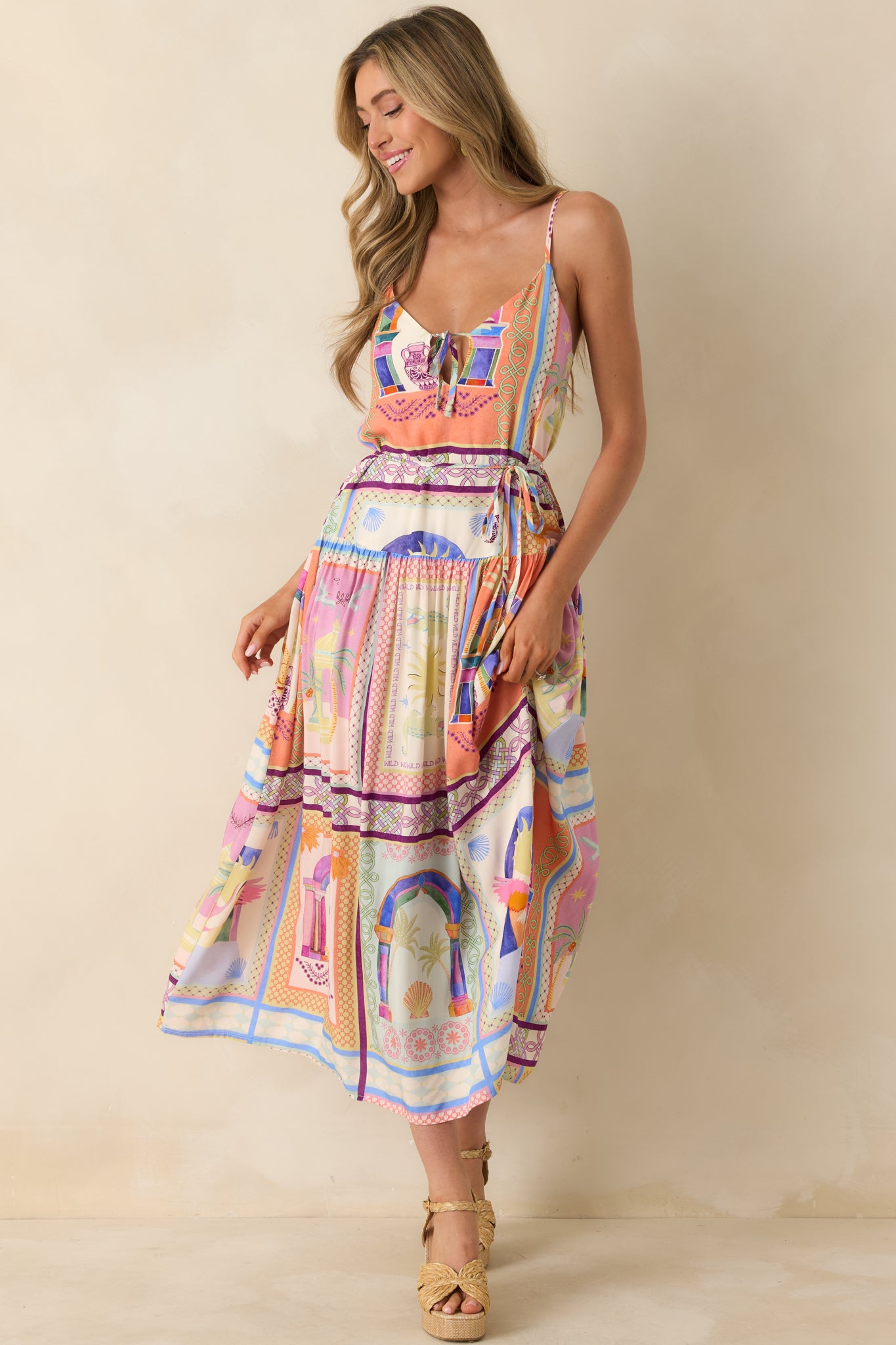 Maxi dress with the multicolor tile pattern, cinched waist tie, and breezy full-length shape.