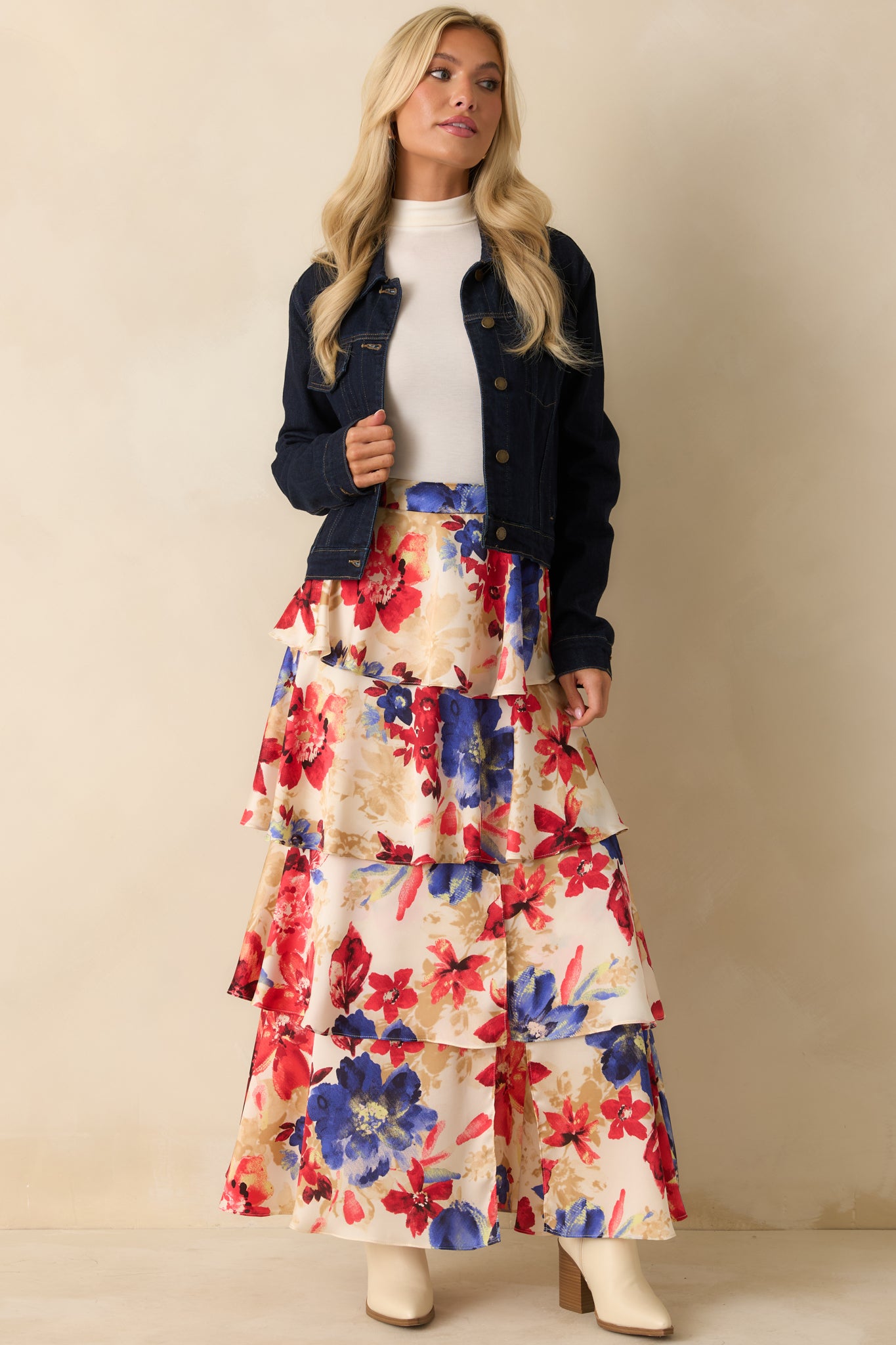 Maxi skirt featuring vibrant allover floral print and an elastic back waistband.