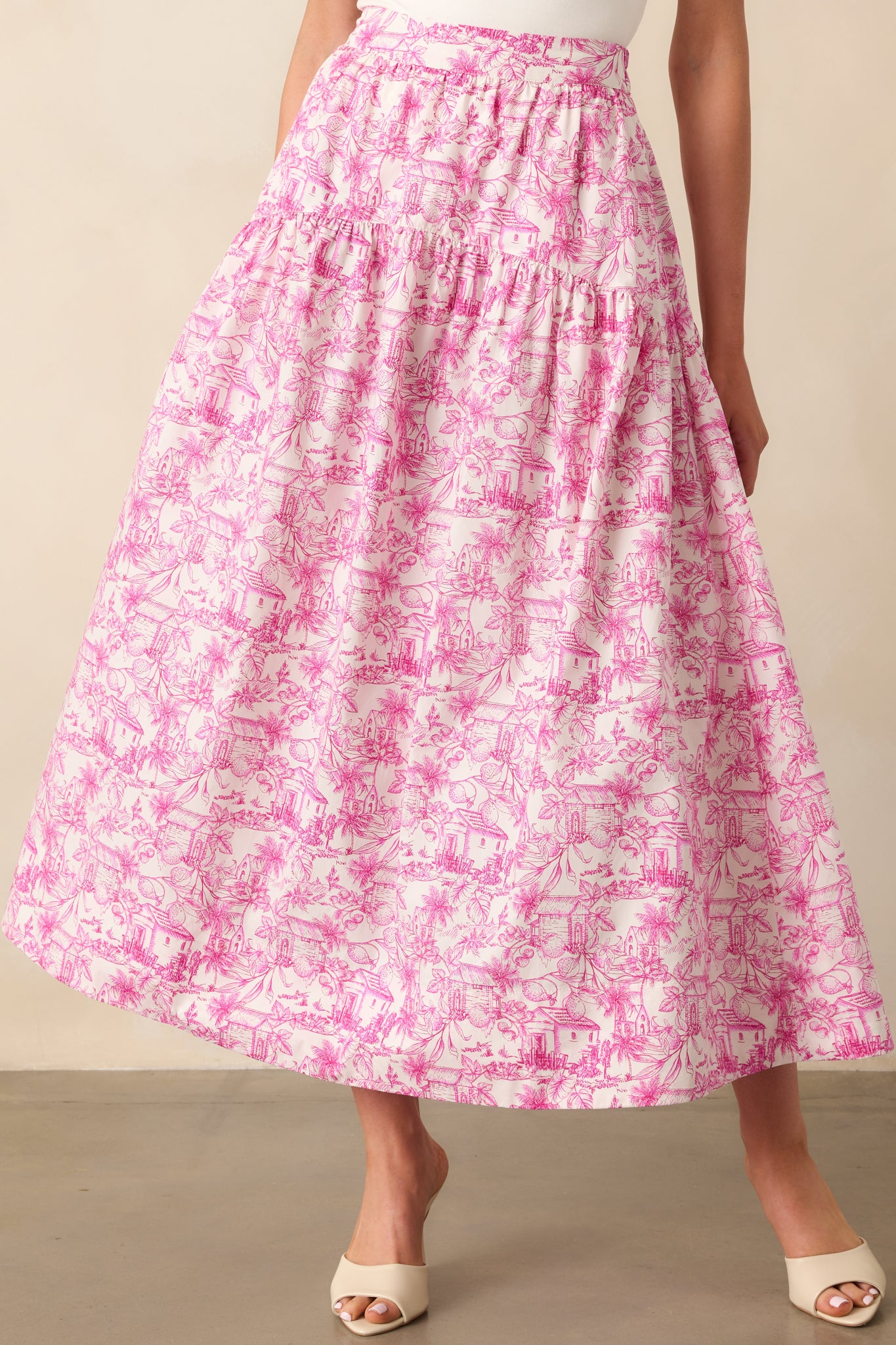Cropped view of maxi skirt showing the tropical toile print and subtle structure of the drop waist.