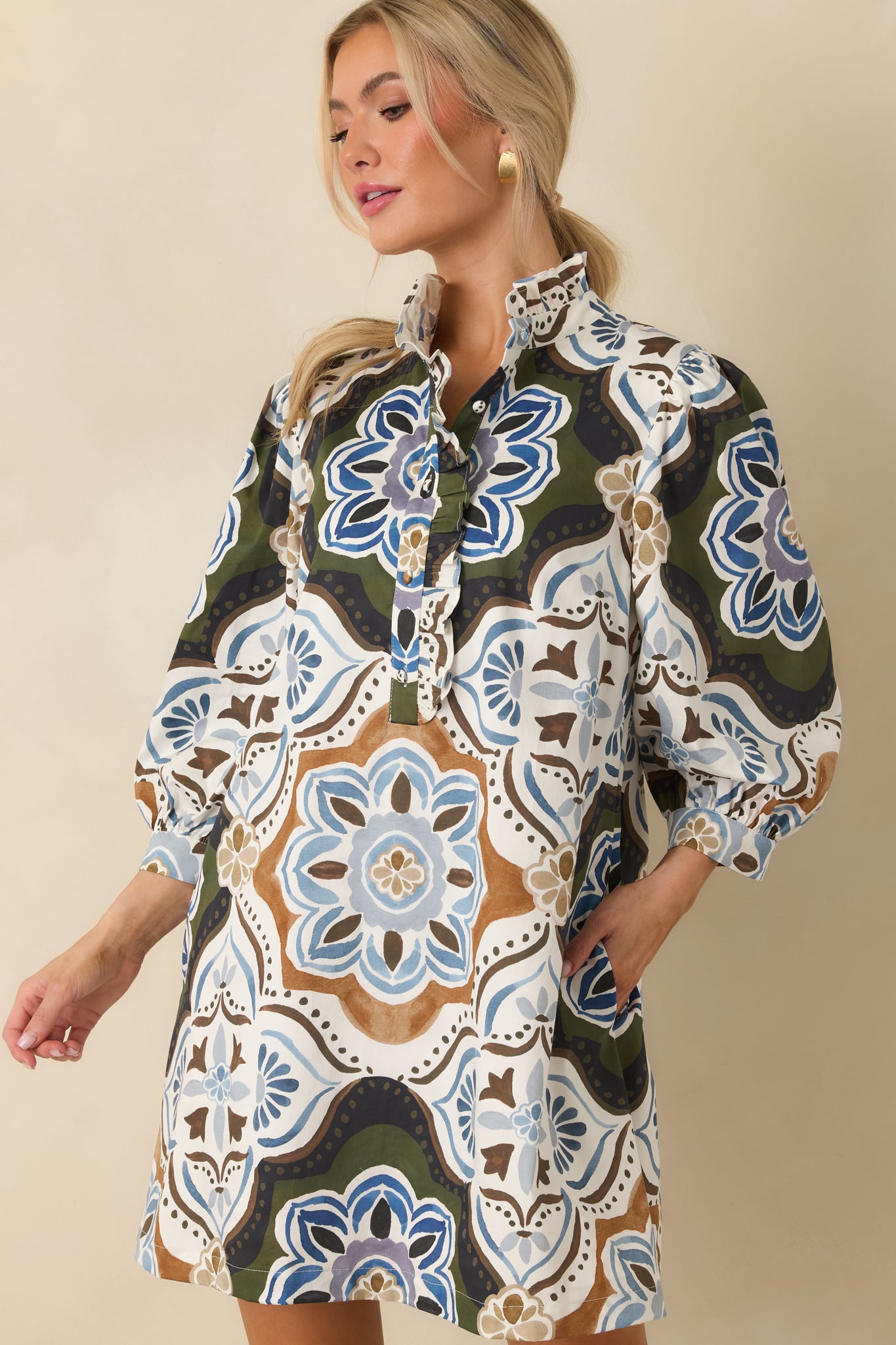 Medallion print dress featuring three-quarter balloon sleeves finished with buttoned cuffs and soft gathered volume.