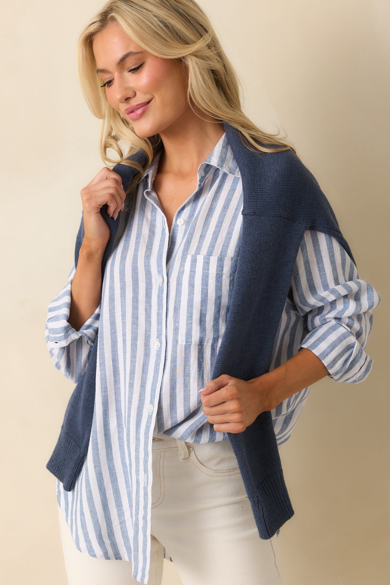 Midsection of the top, showing the long sleeves and lightweight fabric drape.