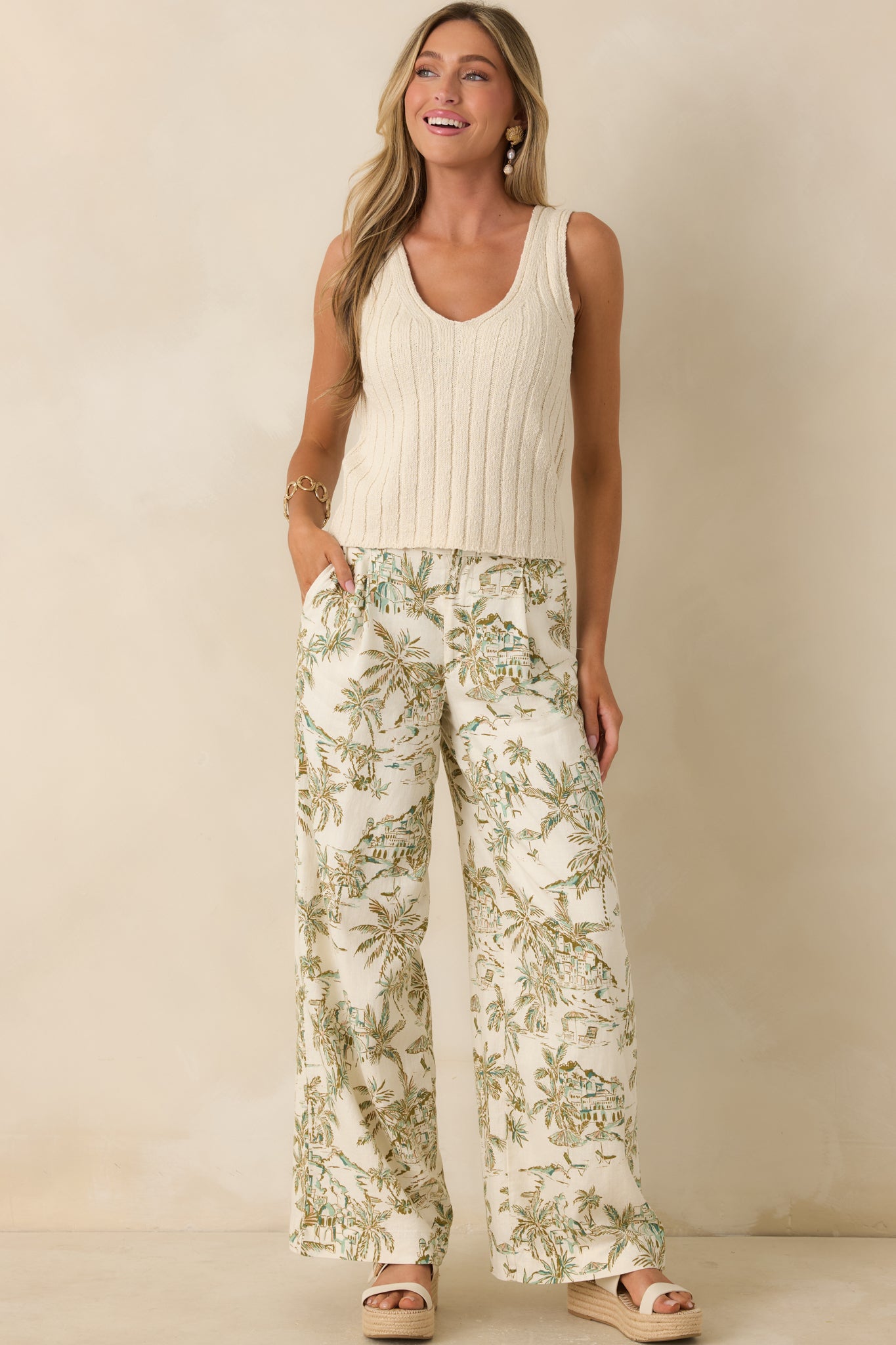 Midweight sweater tank showcasing subtle rib detailing and a classic sleeveless shape.