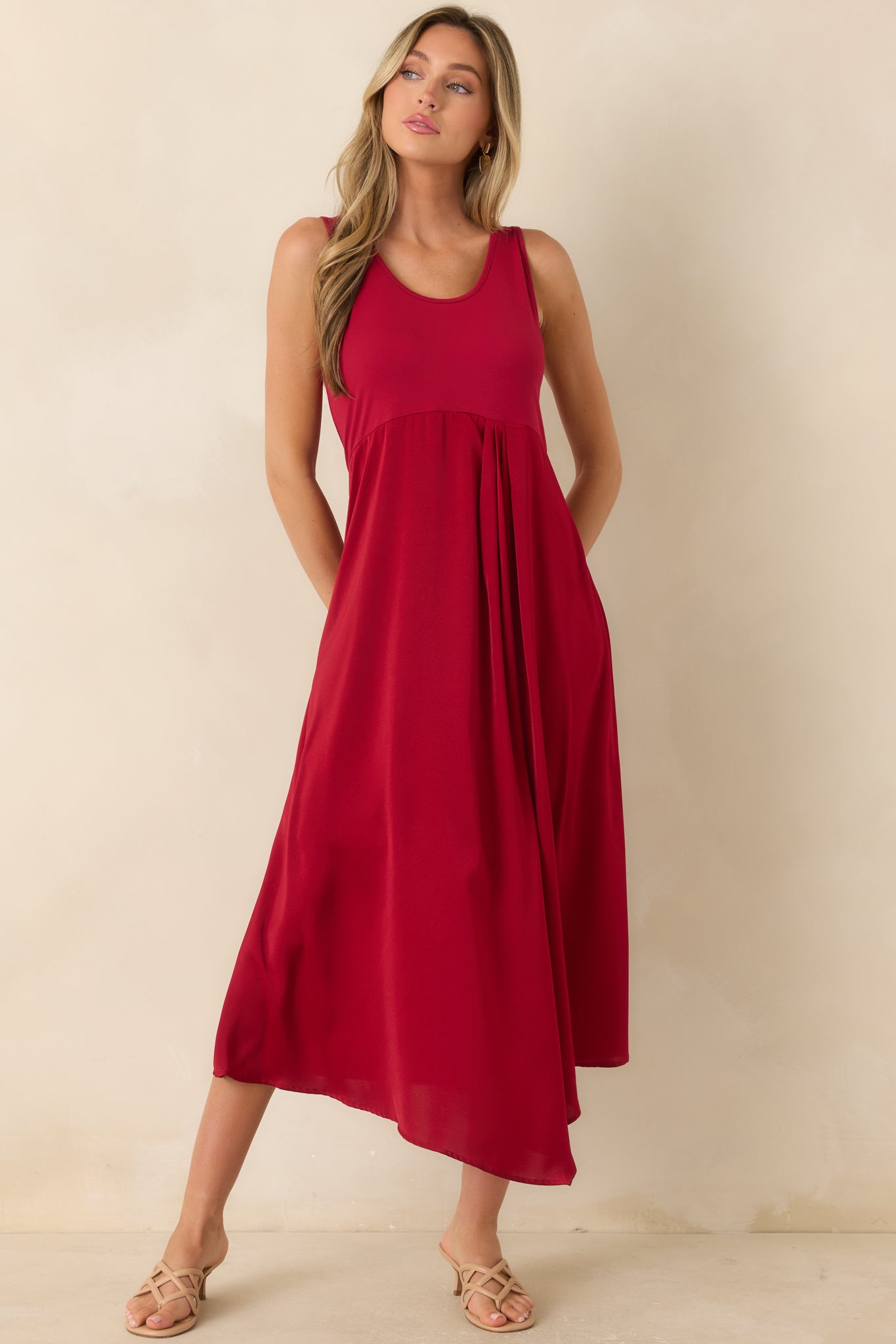 Mixed-texture midi dress with a fitted knit bodice and lustrous satin skirt for a timeless, sophisticated look.