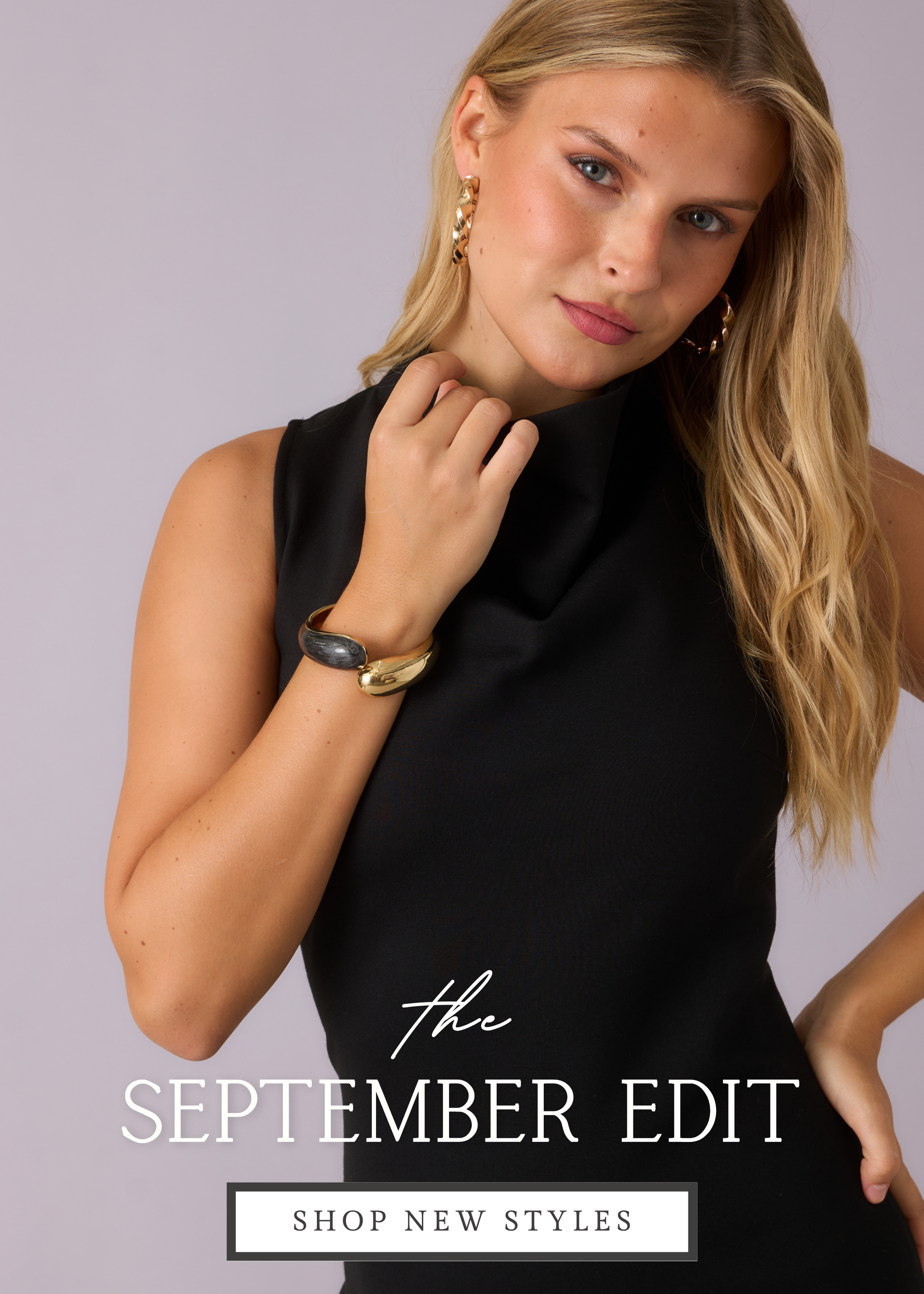 Model wearing black midi dress against a gray backdrop. Text reads: "The September Edit. Shop New Styles."