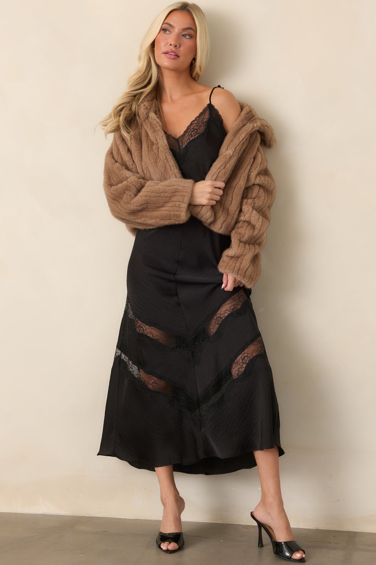 Mocha brown faux fur jacket showcasing the cropped silhouette, ribbed texture, and polished collar.