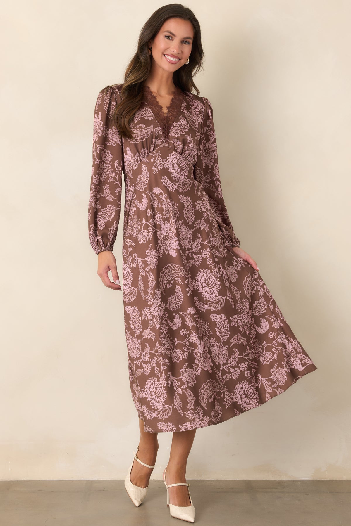 Mocha brown dress showcasing gentle gathers beneath the bust and at the shoulders.