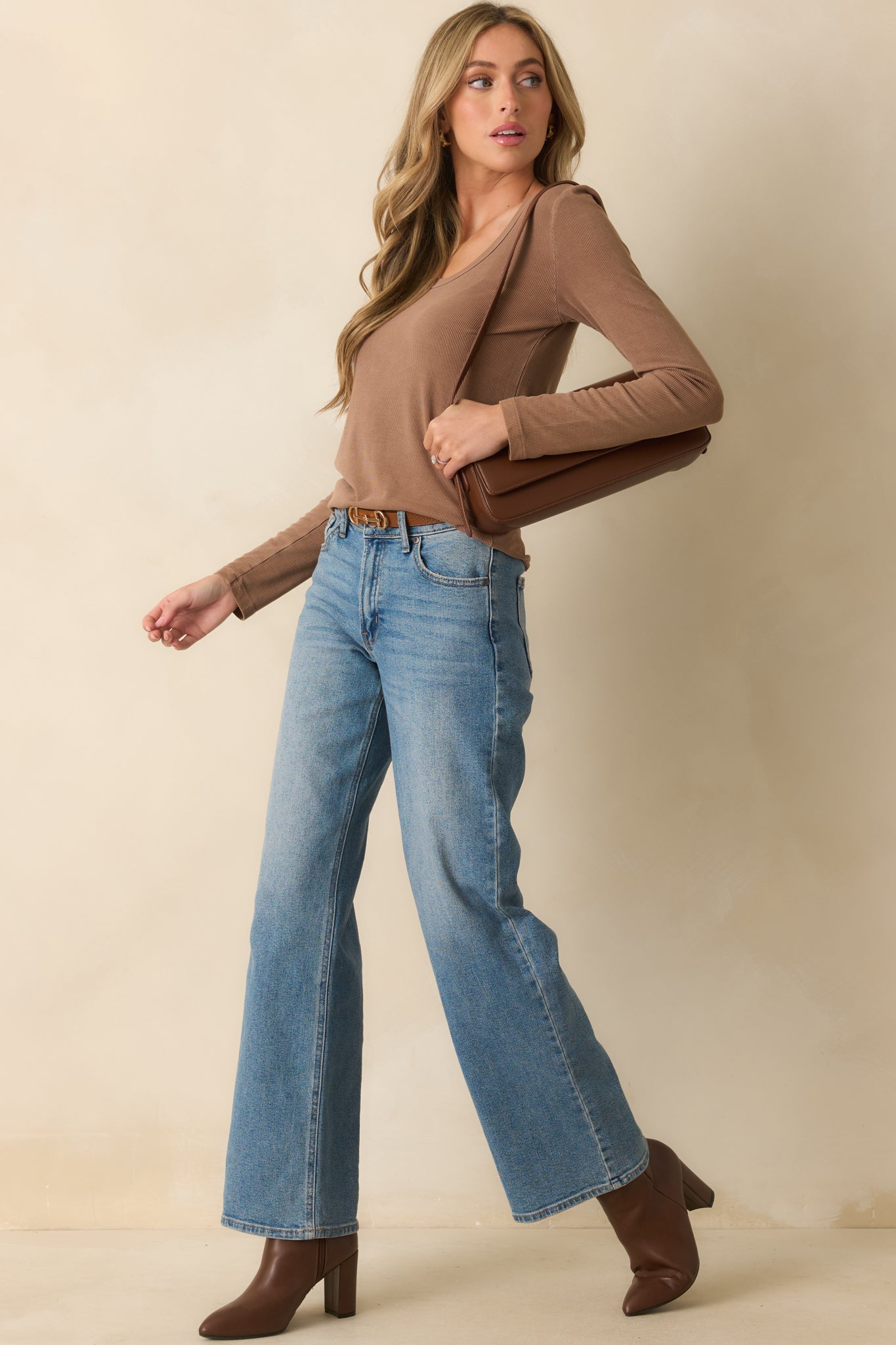 Mocha brown top with a scoop neckline and long sleeves.